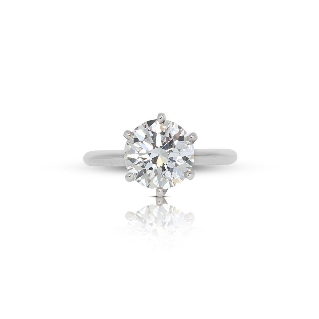 Stunning 2.15 Carat Round Brilliant Diamond Solitaire Ring

This exquisite solitaire ring showcases a dazzling 2.15 carat round brilliant diamond. The diamond is F color and VS2 clarity, with an excellent cut grade, ensuring maximum brilliance and