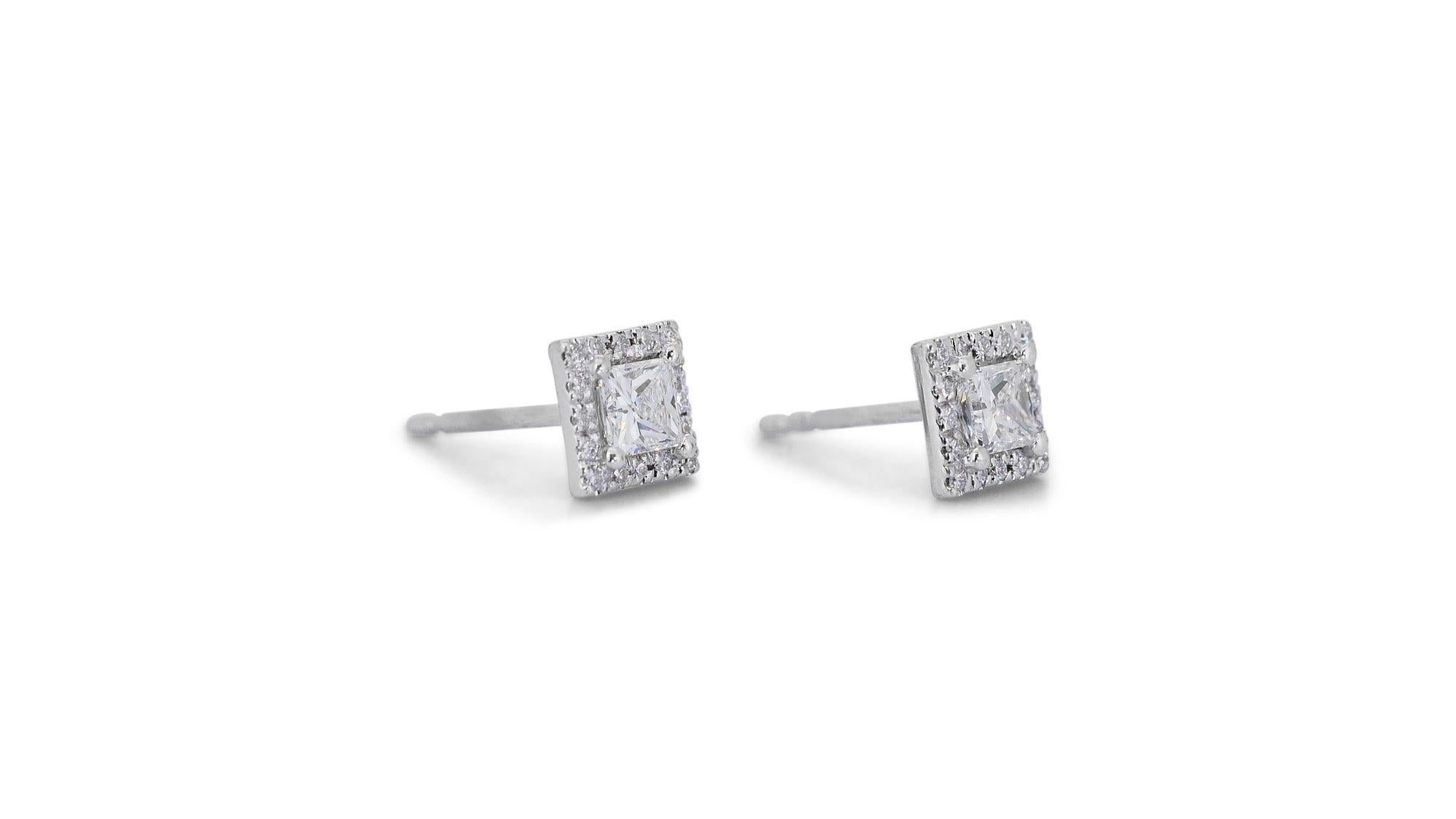 Stunning 2.37ct Diamond Stud Earrings in 18k White Gold - GIA Certified

Experience the luxury of these dazzling diamond stud earrings, crafted from 18k white gold for a timeless, elegant style. The main stones are two square diamonds with