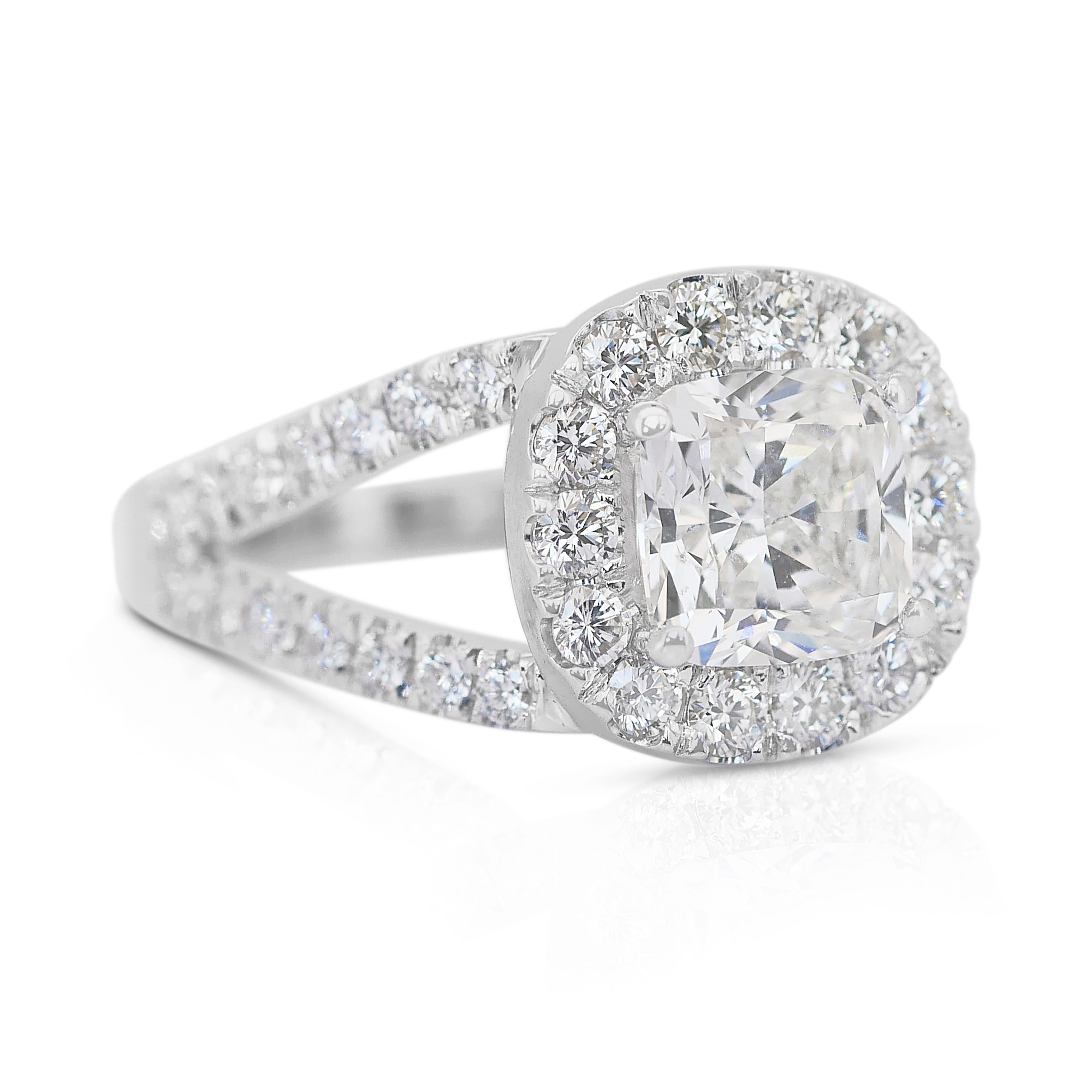 Stunning 2.53ct Diamonds Halo Ring in 18k White Gold - IGI Certified

Exude timeless elegance with this magnificent 18k white gold diamond ring. The centerpiece is a breathtaking 1.72ct cushion-cut diamond, radiating unparalleled brilliance.