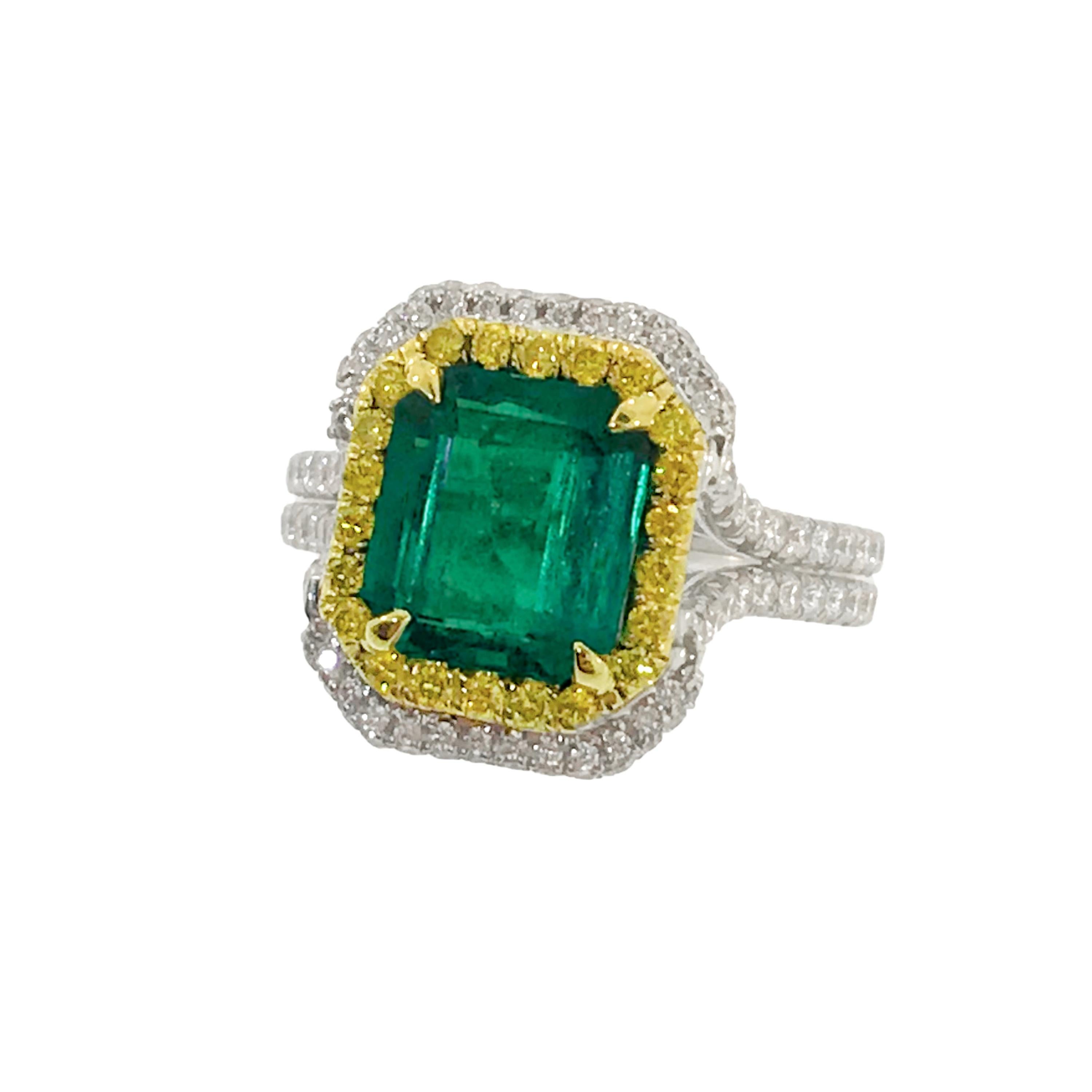 This great ring is of Platinum and 18K Yellow Gold. The 2.76 Carat Colombian Emerald (Colombian Emeralds are considered the 'Rolls Royce' of Emeralds) is of excellent quality exhibiting a deeply saturated Green Color and outstanding transparency! 