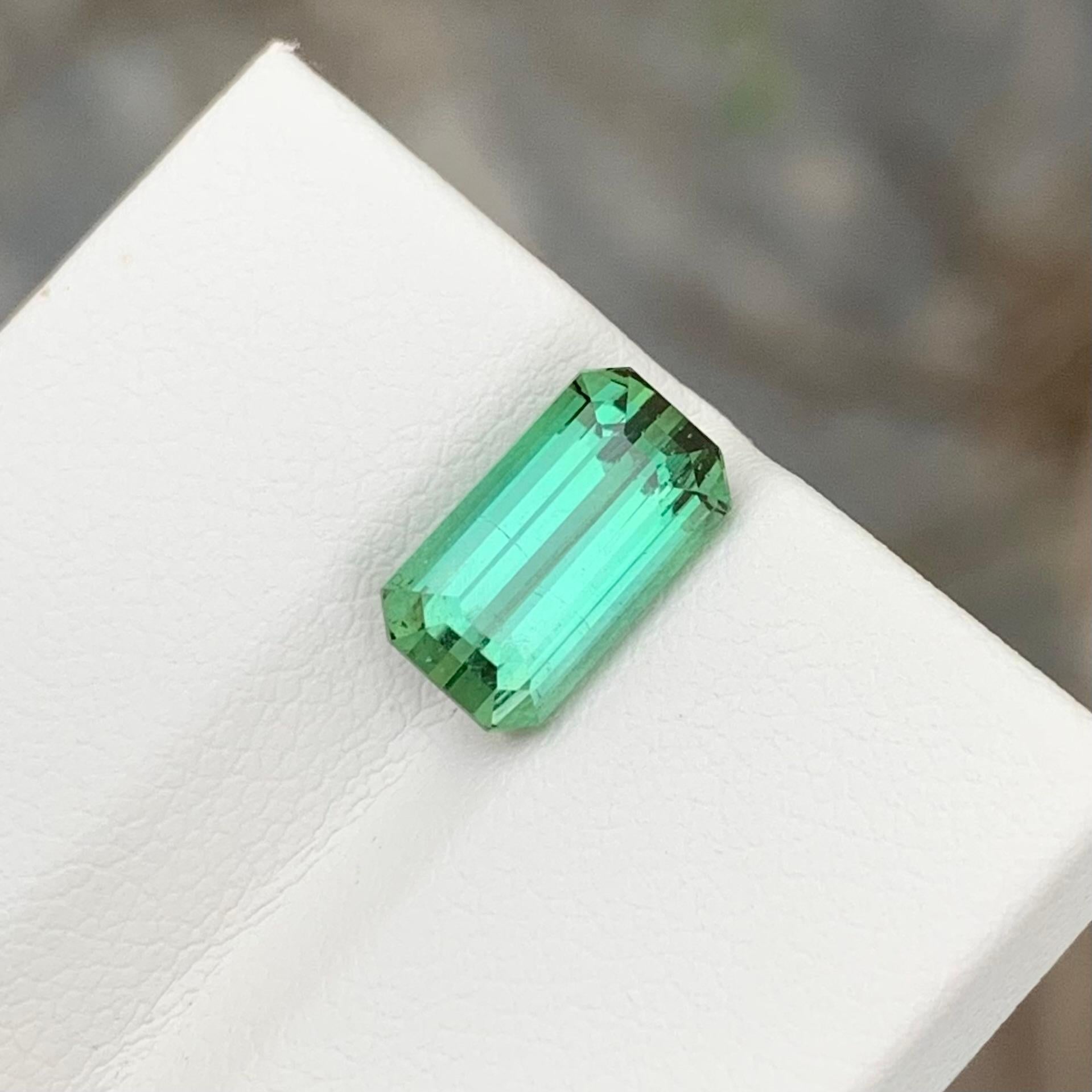 Loose Tourmaline 
Weight: 3.15 Carats 
Dimension: 10.2x5.8x5.8 Mm
Origin: Kunar Afghanistan 
Shape: Emerald 
Color: Mint Green
Treatment: Non
Certificate: On Demand

Mint green tourmaline, with its delicate hue reminiscent of fresh spring foliage,