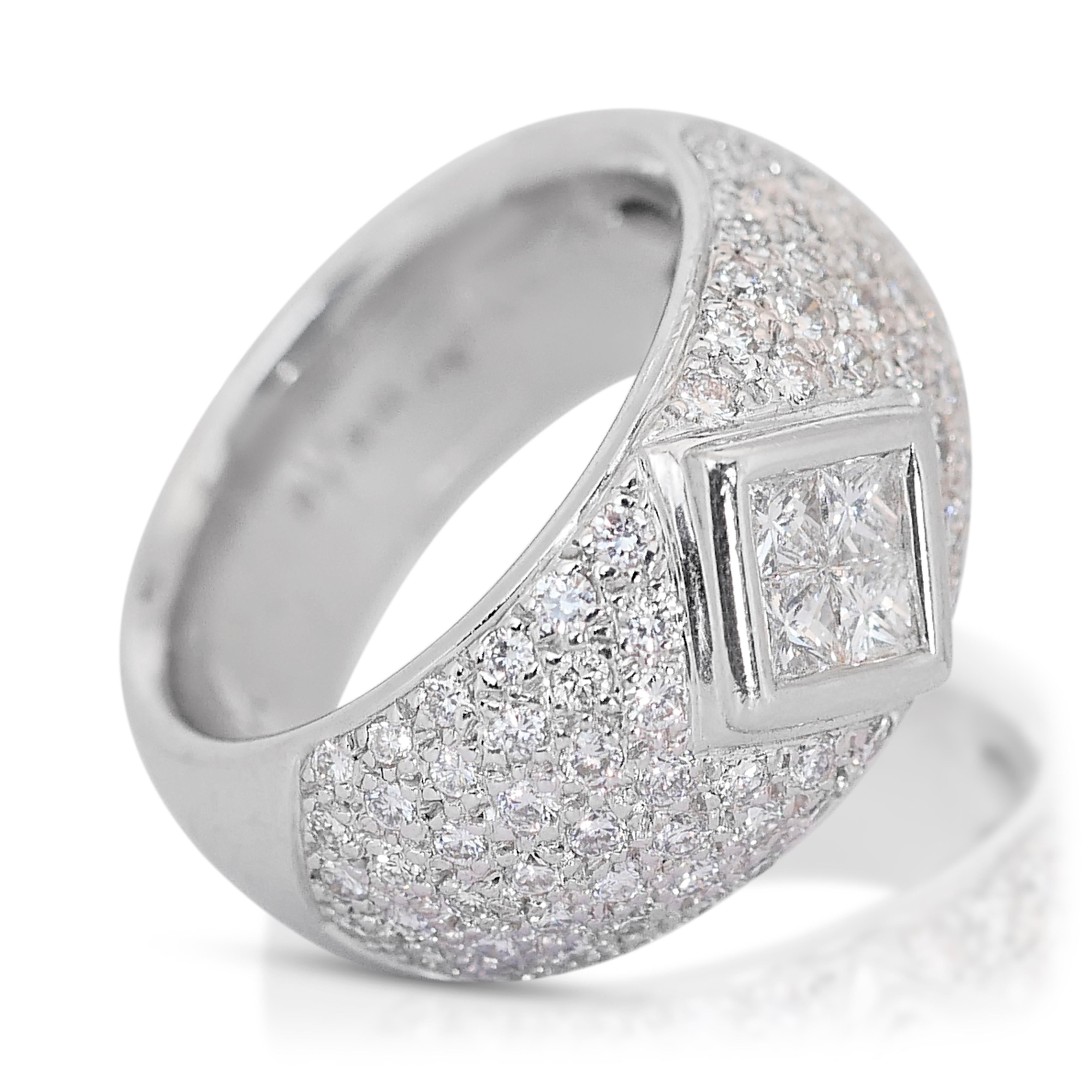 Stunning 3.15 ct Diamond Dome Ring in 18k White Gold - IGI Certified

Elevate your jewelry collection with this stunning diamond dome ring, a testament to elegance and precision craftsmanship. This magnificent piece features a quartet of