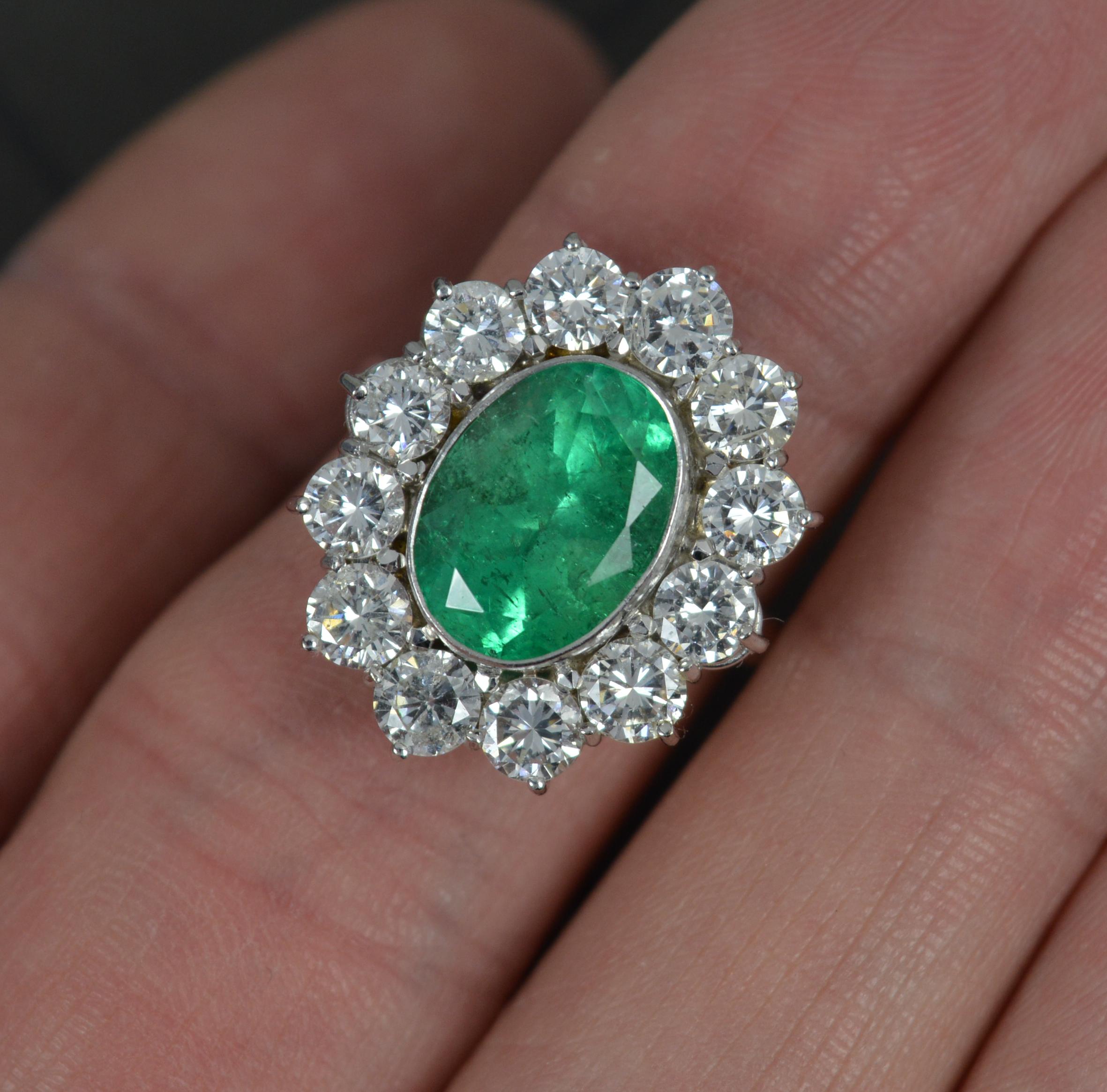 Oval Cut Stunning 3.25ct Emerald and 2.00ct Diamond Platinum Cluster Ring