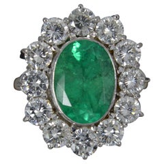 Stunning 3.25ct Emerald and 2.00ct Diamond Platinum Cluster Ring