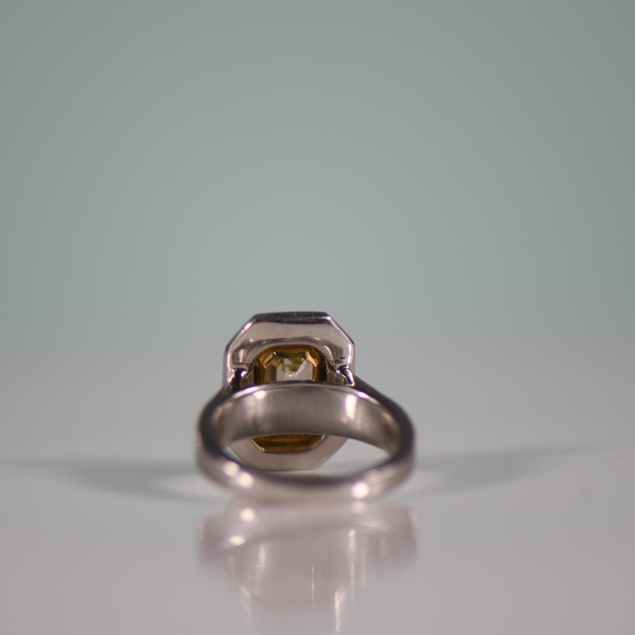 Stunning 3.5 Carat Natural Yellow Emerald Cut Diamond in Custom Platinum Ring In Good Condition For Sale In Addison, TX