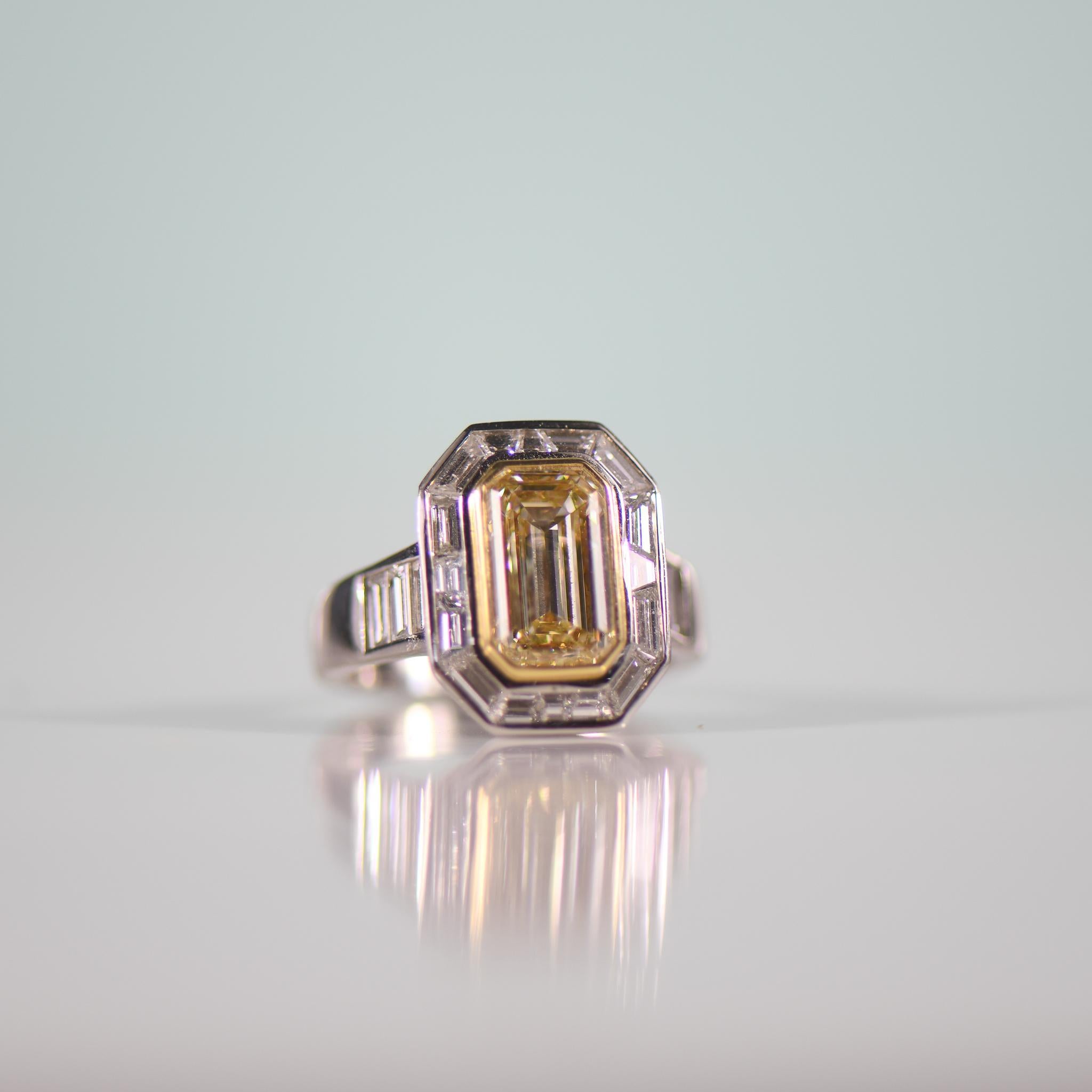 Women's Stunning 3.5 Carat Natural Yellow Emerald Cut Diamond in Custom Platinum Ring For Sale
