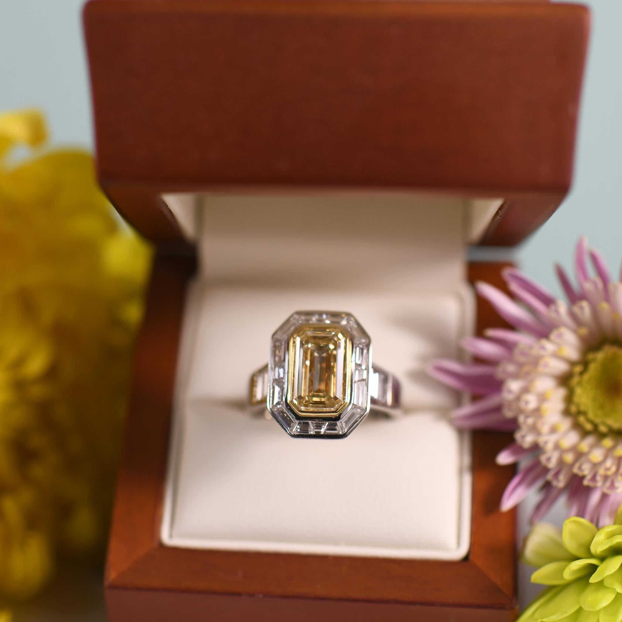 Stunning 3.5 Carat Natural Yellow Emerald Cut Diamond in Custom Platinum Ring For Sale 1