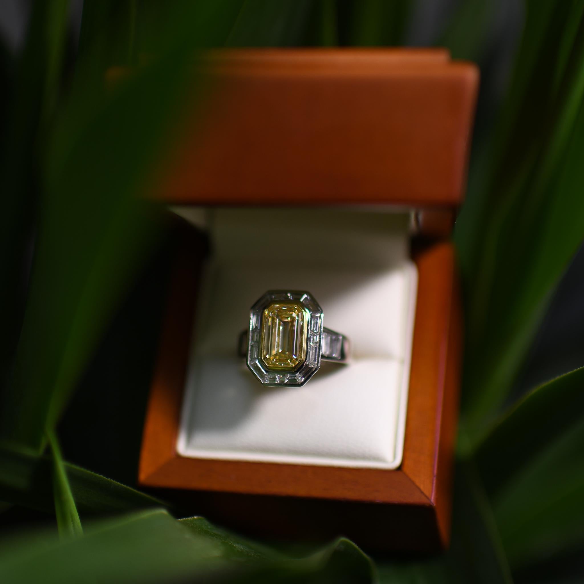 Stunning 3.5 Carat Natural Yellow Emerald Cut Diamond in Custom Platinum Ring For Sale 5