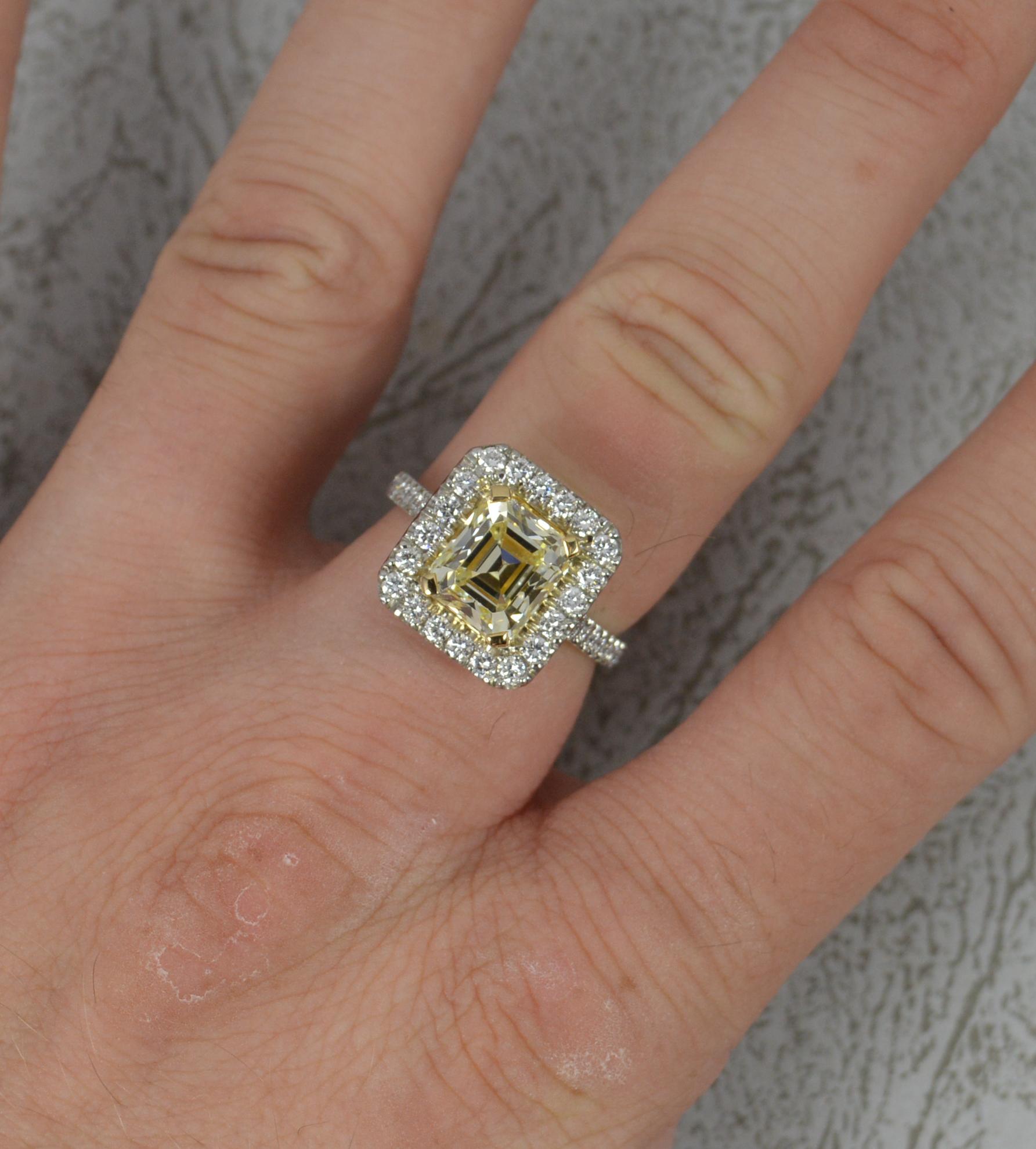A stunning quality Yellow and White Diamond engagement ring.
A contemporary example of art deco design.
Solid 950 grade platinum shank and 18ct yellow gold closed setting for the central diamond.
Designed with a 7.4mm x 9.0mm emerald cut natural