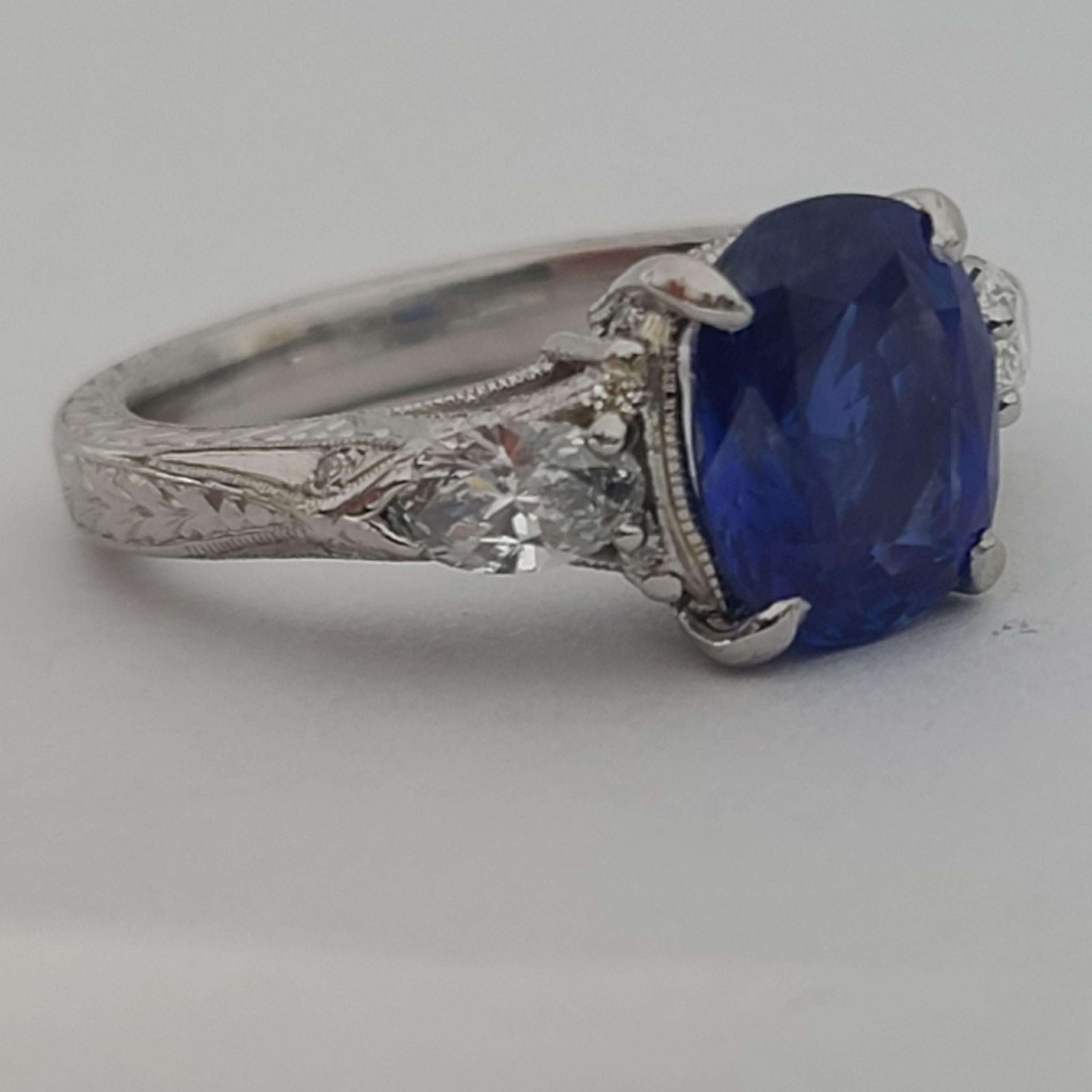 Stunning 3.91ct Natural Blue Sapphire 1.10ctw Diamond E-F VVS2-VS2 JBI Platinum  In Good Condition For Sale In St. Petersburg, FL