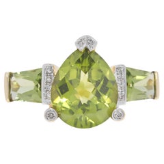Impresionante Anillo de Oro Amarillo de 18 K con Peridoto y Diamante Natural de 3,96 ct