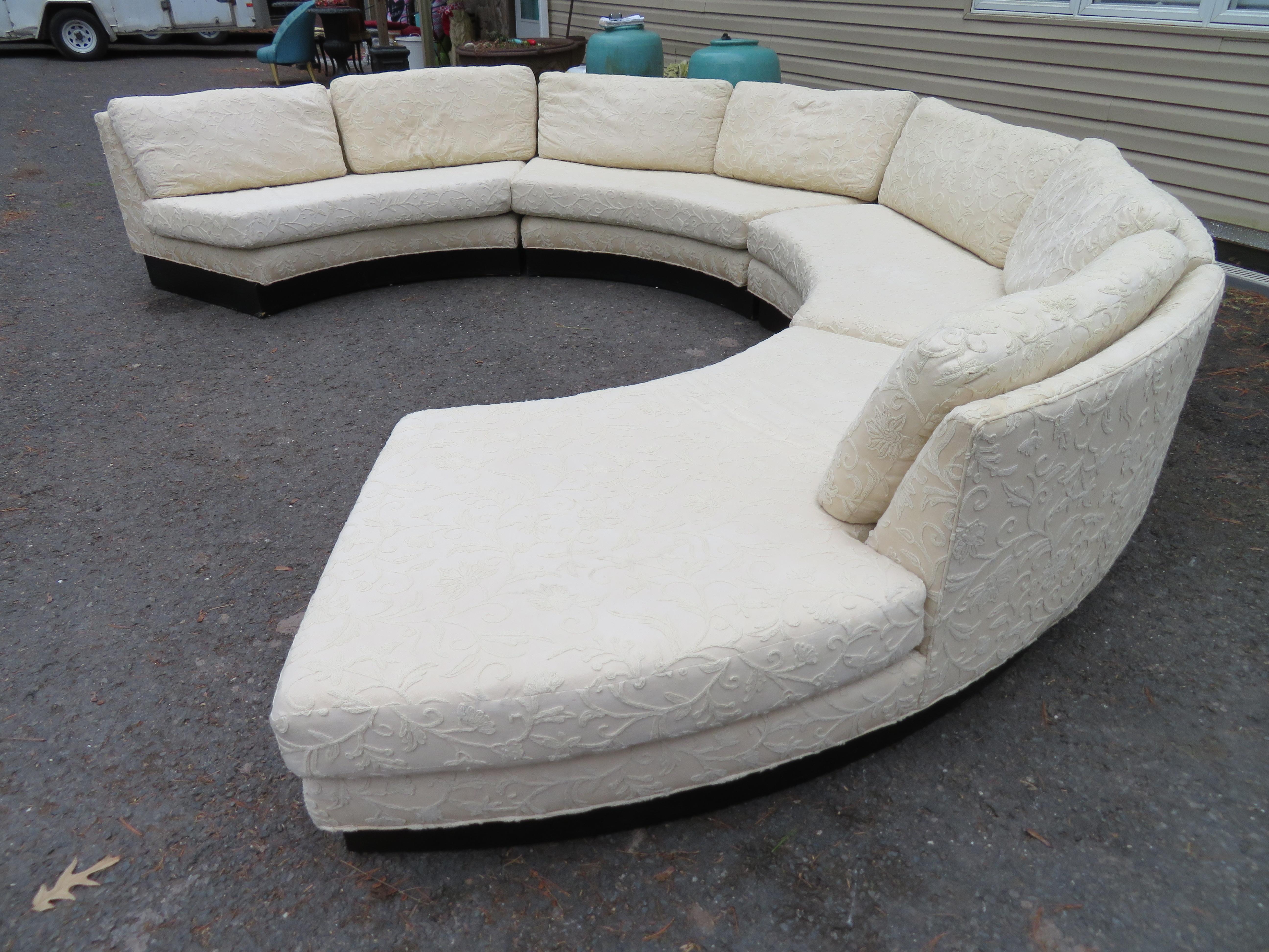 Stunning 4-piece circular Erwin Lambeth sectional sofa. This vintage sectional sofa is quality through and through from the down-filled seat cushions to the thick ebonized plinth base-very stylish. We love the open end section on the one side
