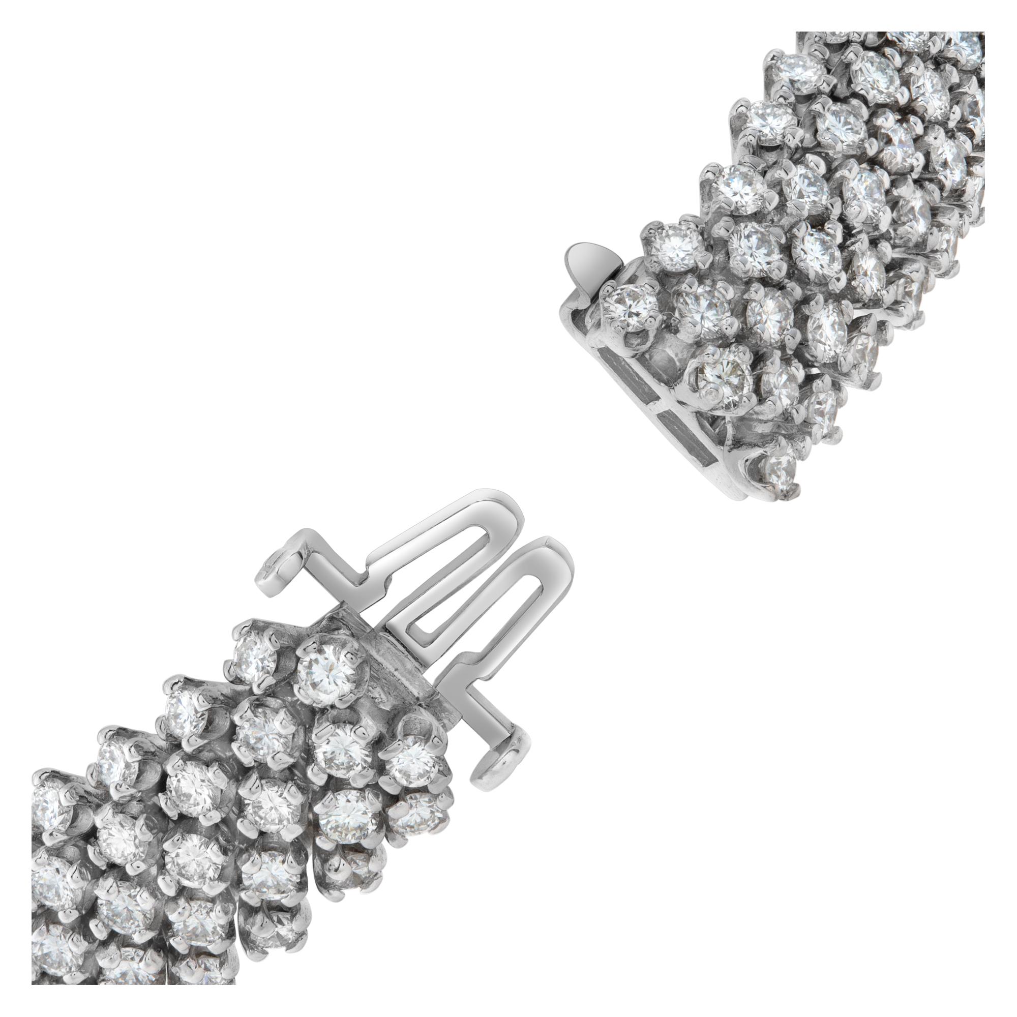 Women's Stunning 5 rows diamond line bracelet in 18k white gold. Over 9 carats-