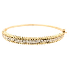 Stunning .50ctw Diamond Hinged Bangle Bracelet in Yellow Gold