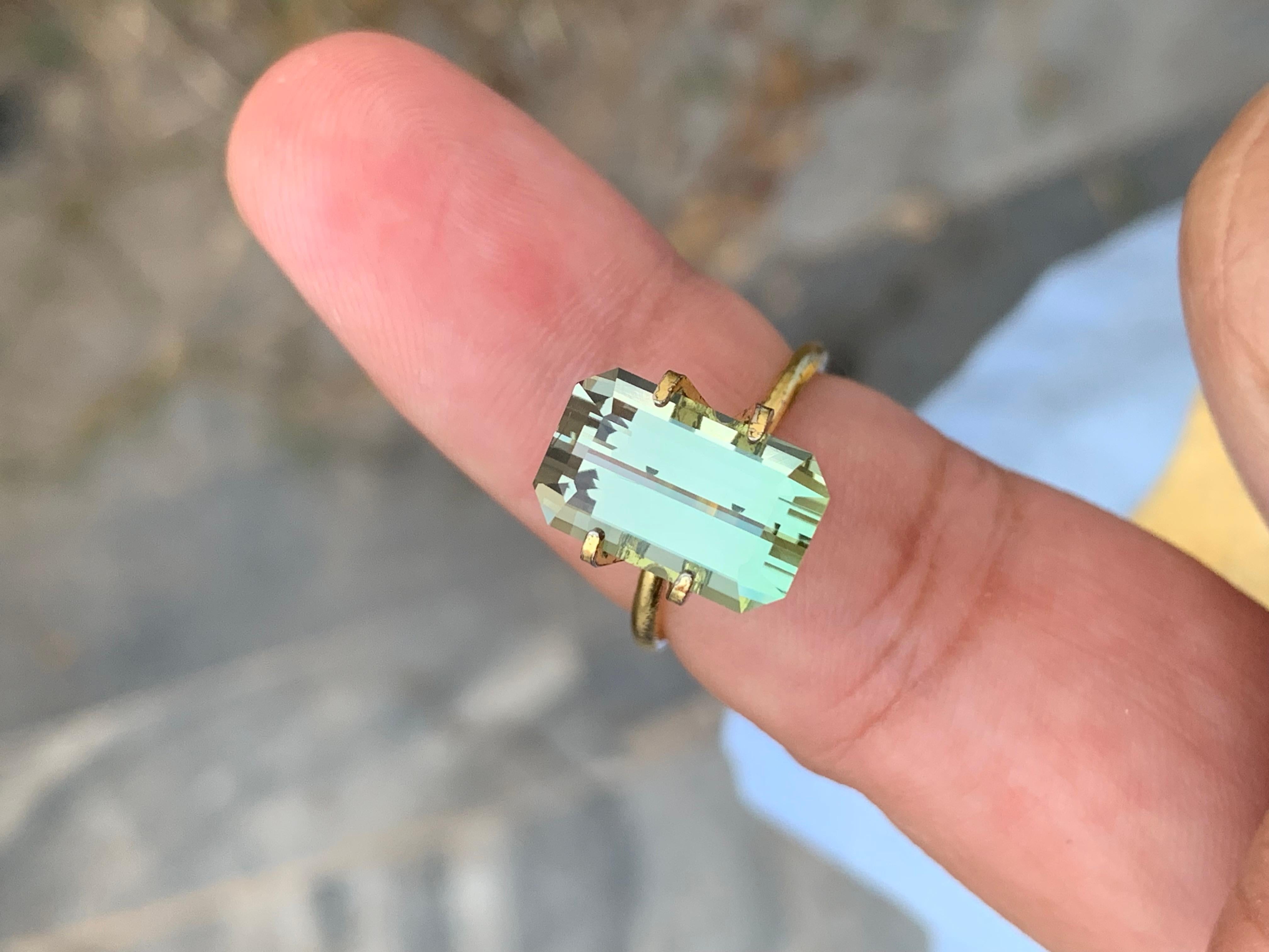 Loose Tourmaline 
Weight: 6.10 Carats 
Dimension: 13.1x8.2x6.4 Mm
Origin: Afghanistan 
Shape: Emerald 
Color: Light Green
Treatment: Non
Certificate: On Customer Demand
Tourmaline is a fascinating and versatile gemstone renowned for its vibrant