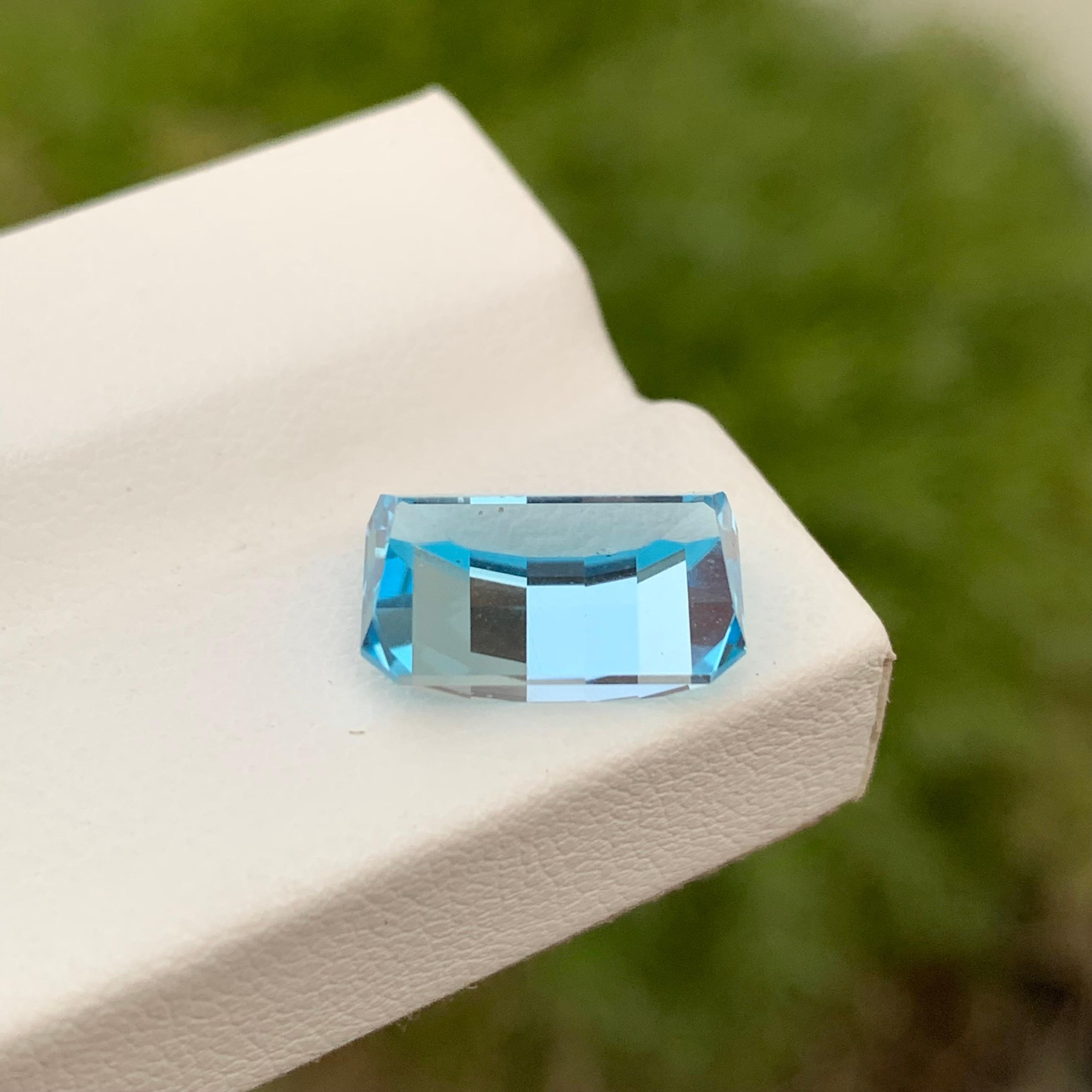 Loose Sky Blue Topaz
Weight: 6.15 Carats 
Dimension: 12.6x7.8x6.1 Mm
Origin: Brazil
Shape: Emerald Bar Cut
Treatment: Non
Color; Blue 
Certificate; On Demand
Sky Blue Topaz, a radiant gemstone that mirrors the clear and tranquil hues of the sky, has