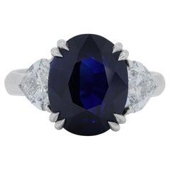 Stunning 7.01ct Sapphire Ring with Side Diamonds in 18K White Gold