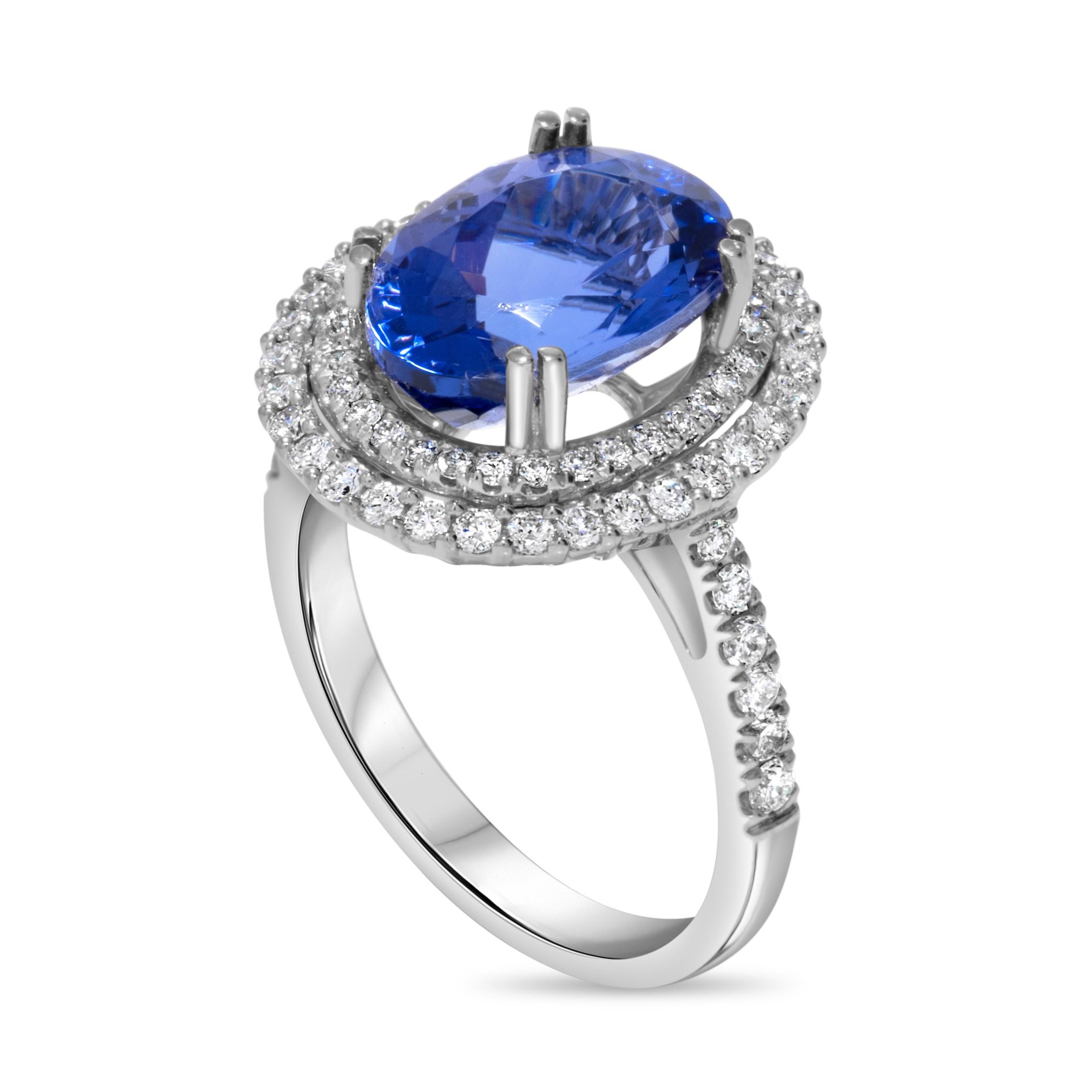 Atemberaubender 7,73 Karat blauer ovaler Tansanit & Diamantring aus 18 Karat Weißgold (Zeitgenössisch) im Angebot