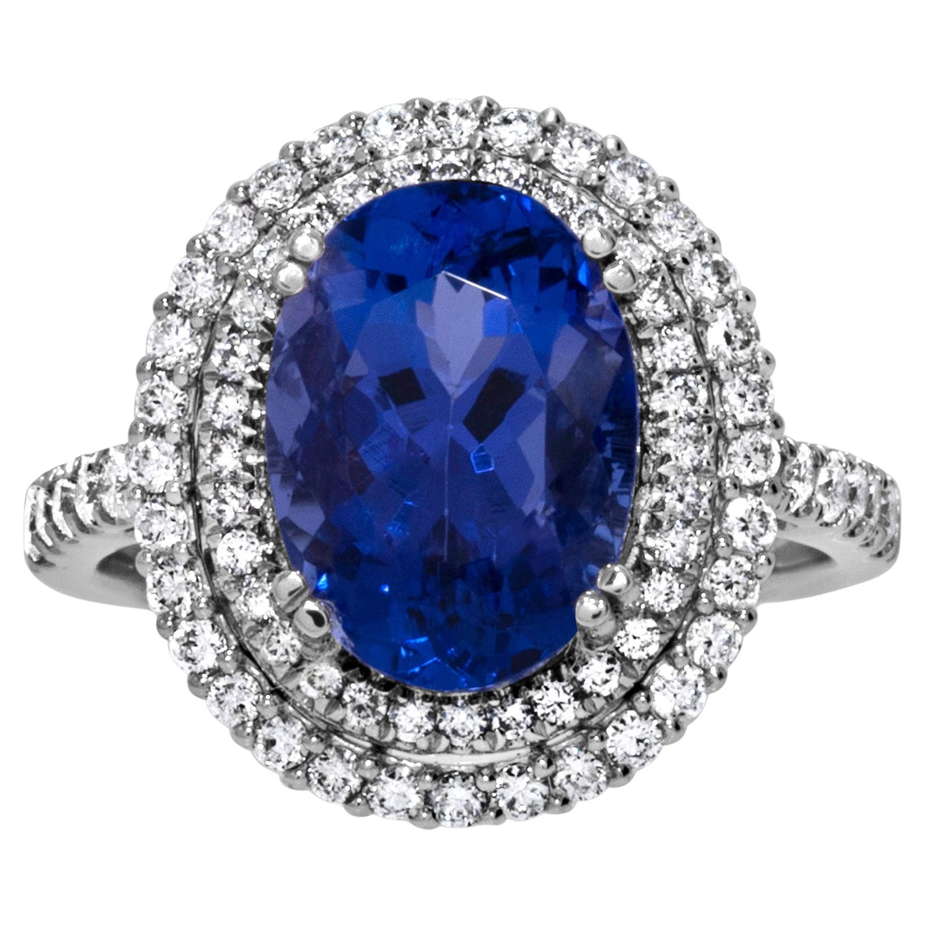 Stunning 7.73 Carat Blue Oval Tanzanite & Diamond Ring in 18k White Gold