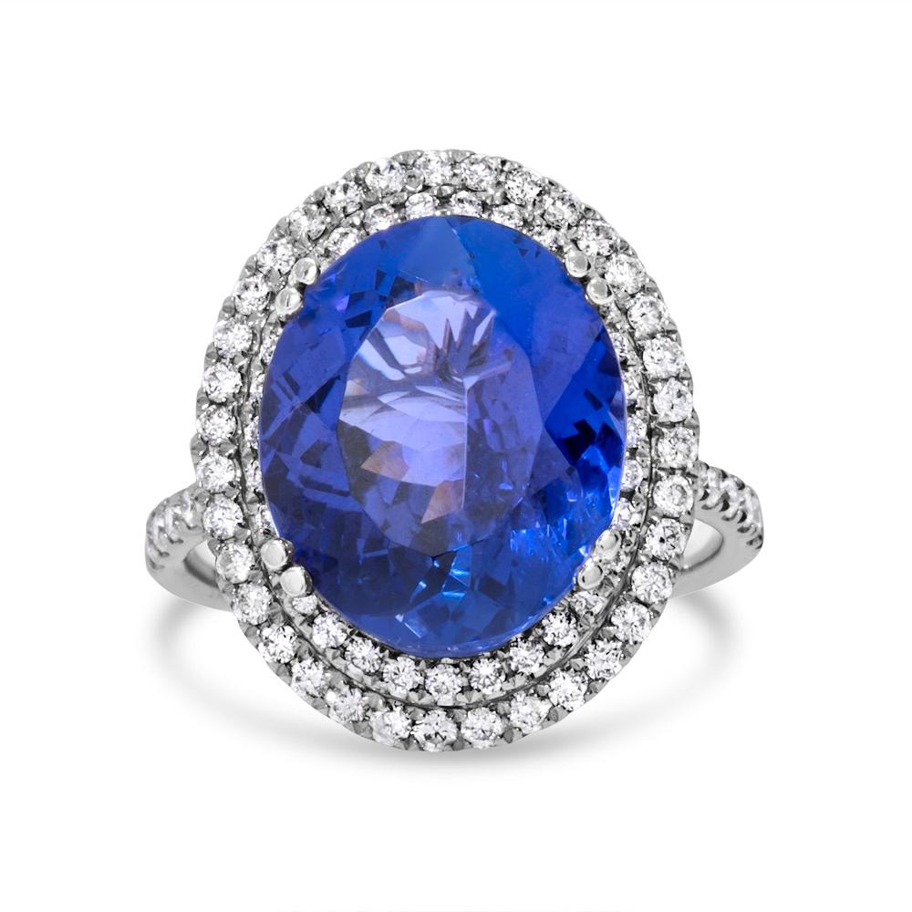 Taglio ovale Stupendo anello con tanzanite ovale viola bluastra e diamanti da 9,45 carati in oro bianco 18 carati in vendita