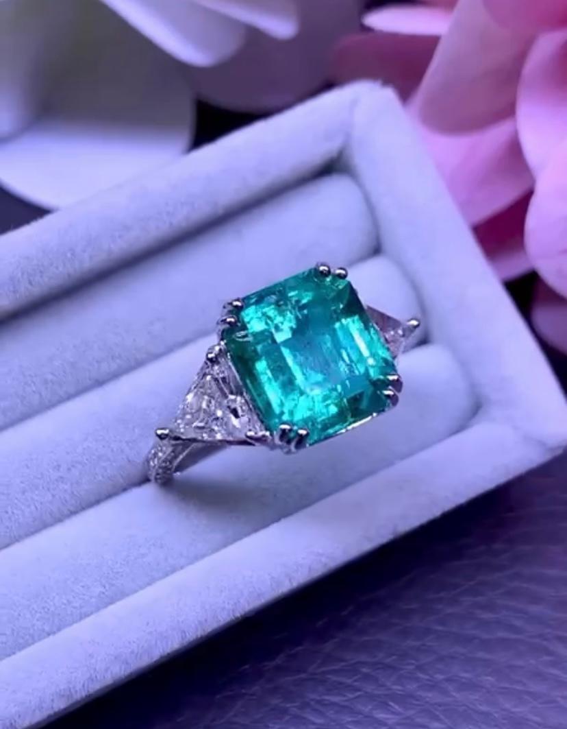 Octagon Cut  GIA - AIG  Certified 7.36 Carat Zambian Emerald  2.20 Ct Diamonds 18K Gold Ring For Sale