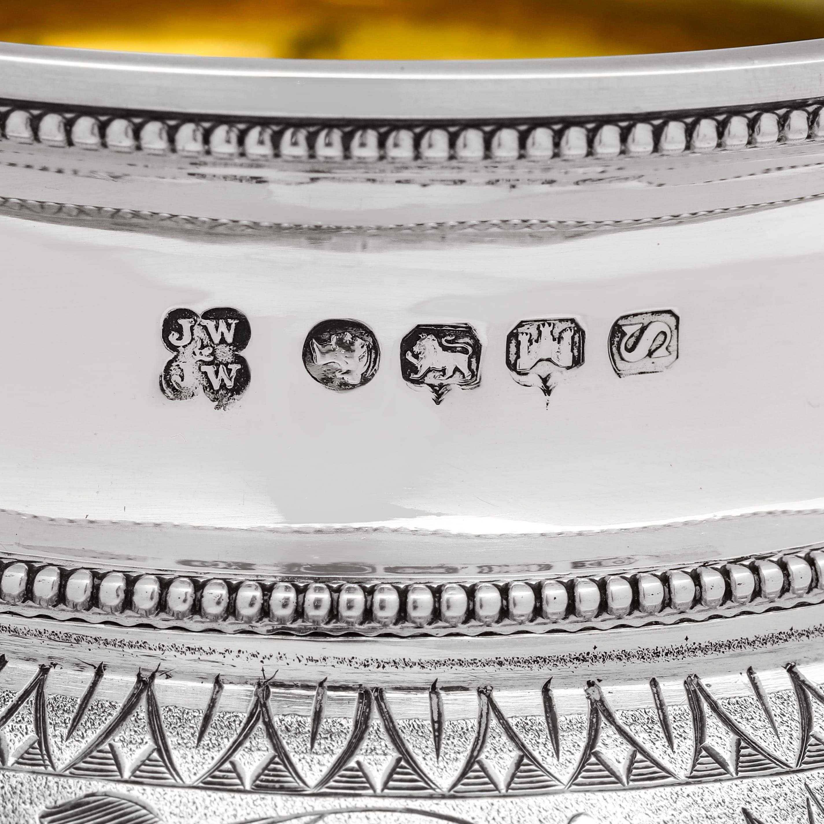 Hallmarked in Exeter in 1874 by James & Josiah Williams, this exquisite, Victorian, Antique Sterling Silver 4 Piece Tea Set, features incredible aesthetic design influenced engraving throughout, and original gilding to the inside of the sugar bowl
