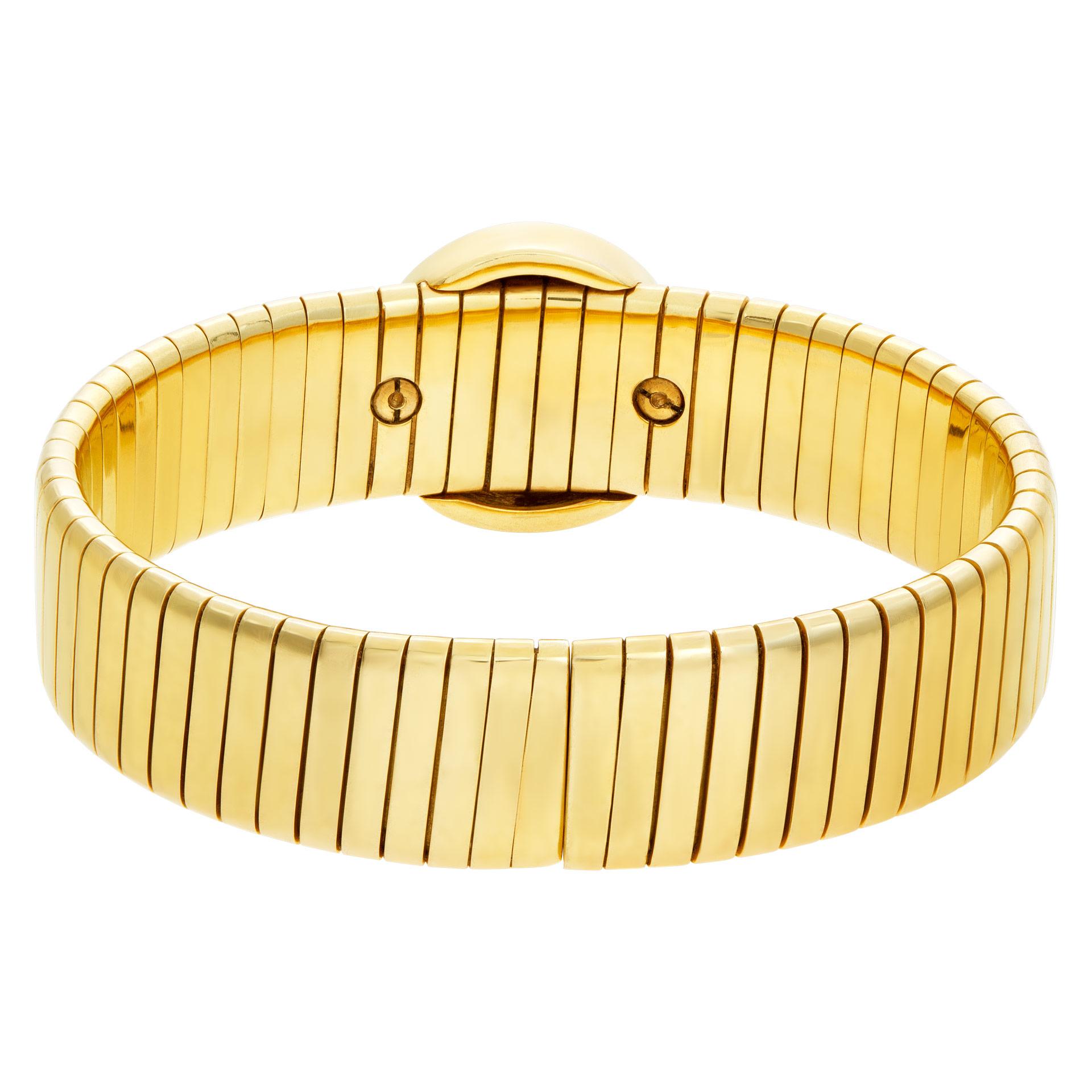 ESTIMATED RETAIL $9890 - YOUR PRICE $6990 - Stunning cuff bangle set with an ancient coin of Massimiliano Ercole (286-305) in 18k yellow gold. Fit for wrist sizes 6''+. 0.50