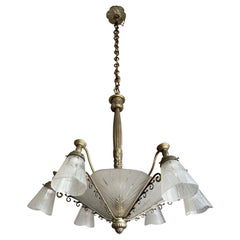 Superbe et rare lustre Art déco français ancien à neuf lumières en bronze et verre