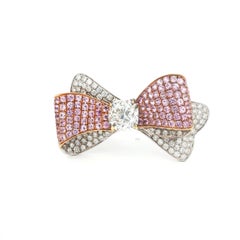 Stunning and Unique Pink Sapphire and 3 CT VS1 Diamond Bow Platinum Ring
