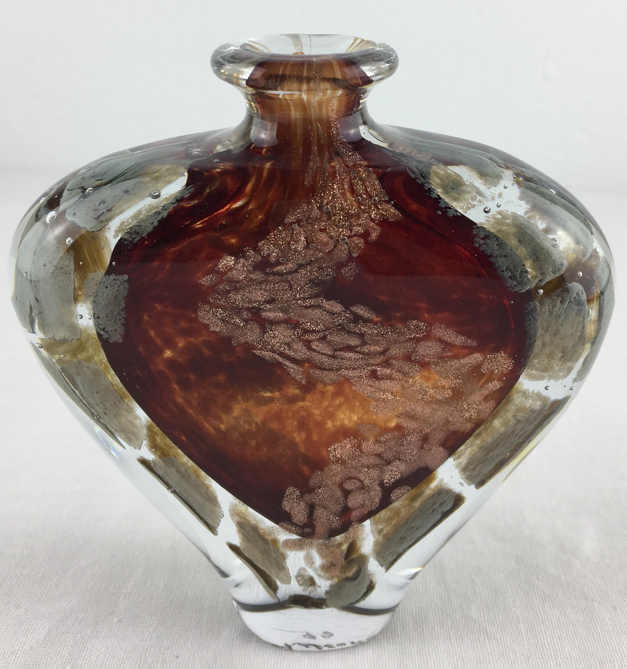 A unique and rare handcrafted heart shaped vase by Michele Luzoro, known as the Diva of Biot having radiated on the international glass landscape for more than thirty years. 

This heart shaped stem glass vase is blown with gold inclusion pallets is