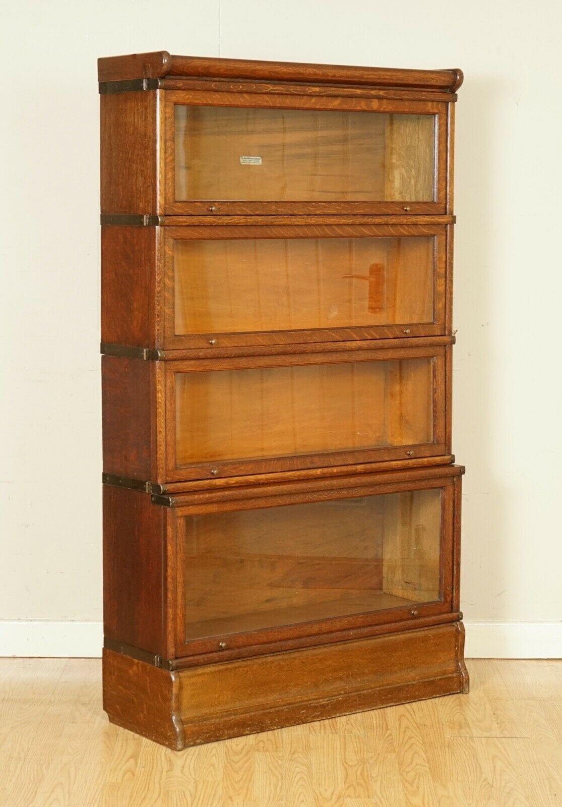 We are delighted to offer for sale this Stunning Antique Oak Original Globe Wernicke Four Barristers Bookcase Circa 1920's
A very well made piece, highly desirable especially in this condition.
We have lightly restored this by giving it a hand