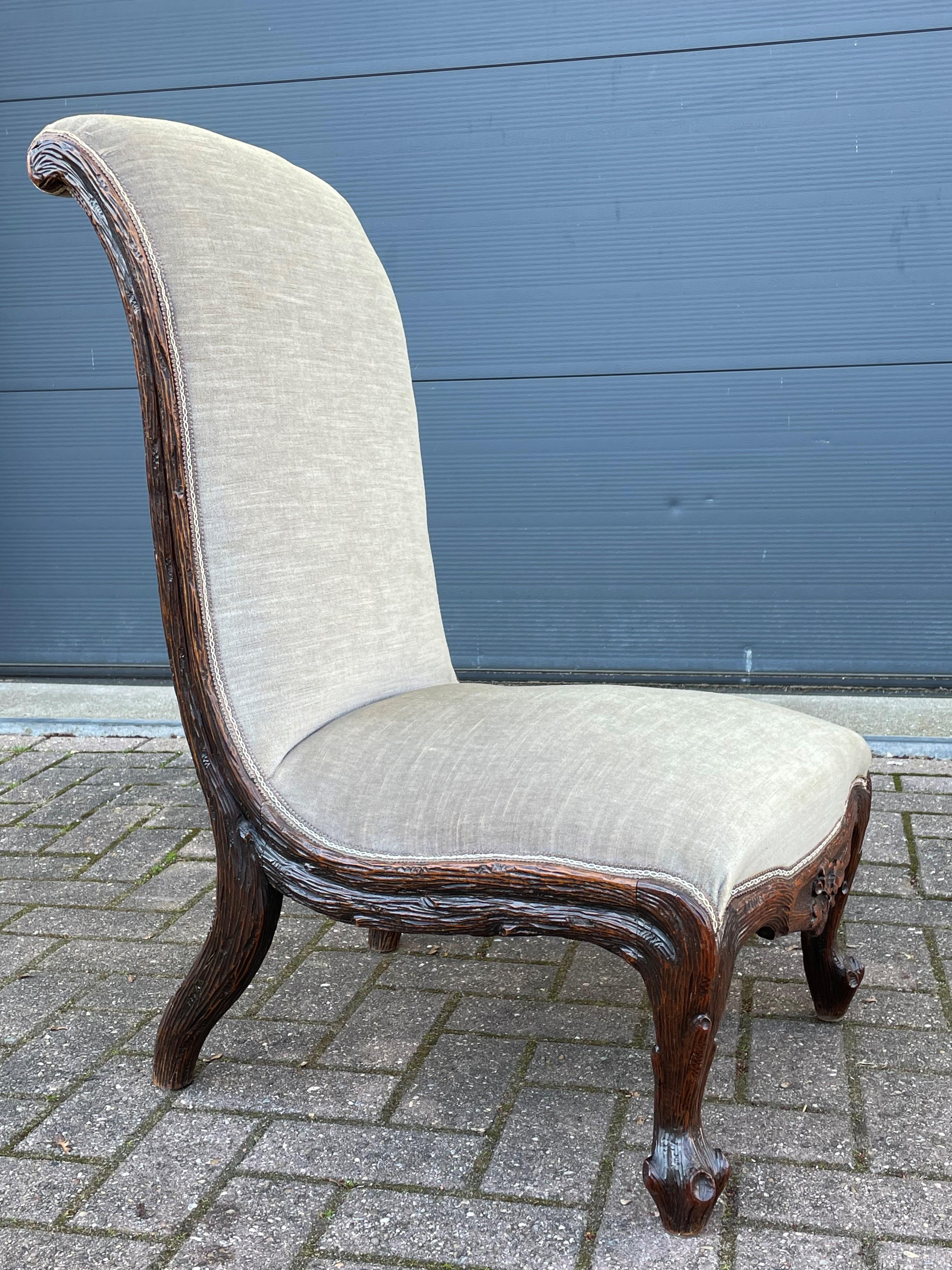Amazing quality carved, great condition, beautifully upholstered and rare antique chair.

Over the years we have sold beautiful Black Forest antiques and the best quality that was made in Holland was made by Horrix of the Hague. When we first saw