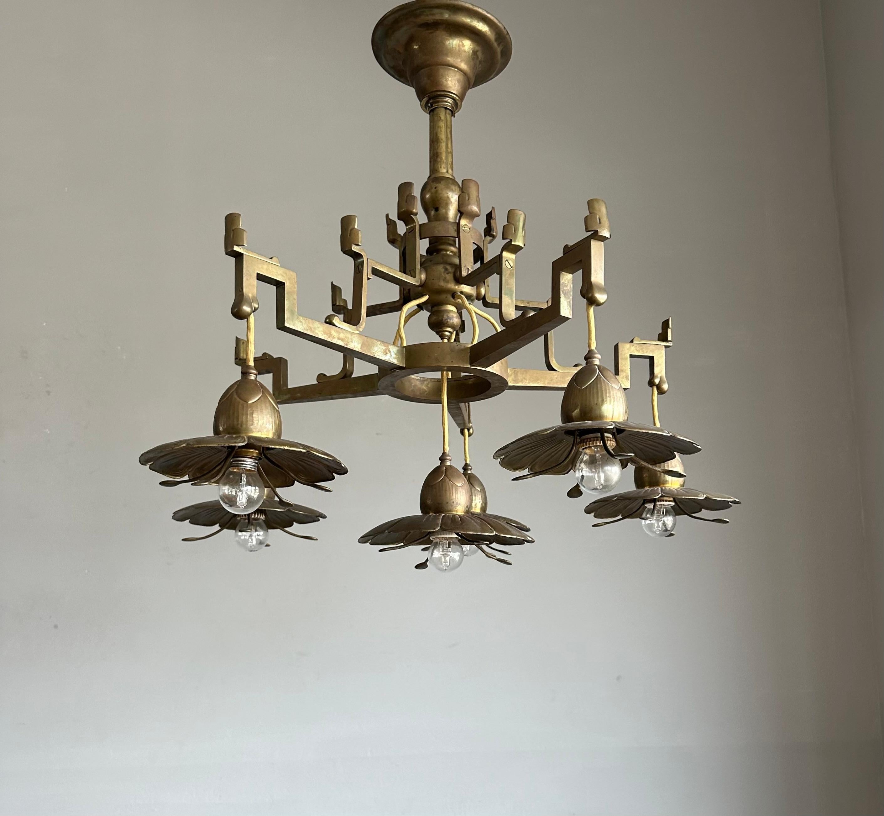 Six-light chandelier with stylish lotus flower shades.

If you are looking for a one of a kind and truly amazing hand-crafted antique pendant to light up both your days and evenings then this Asian Style work of lighting art could be yours to own