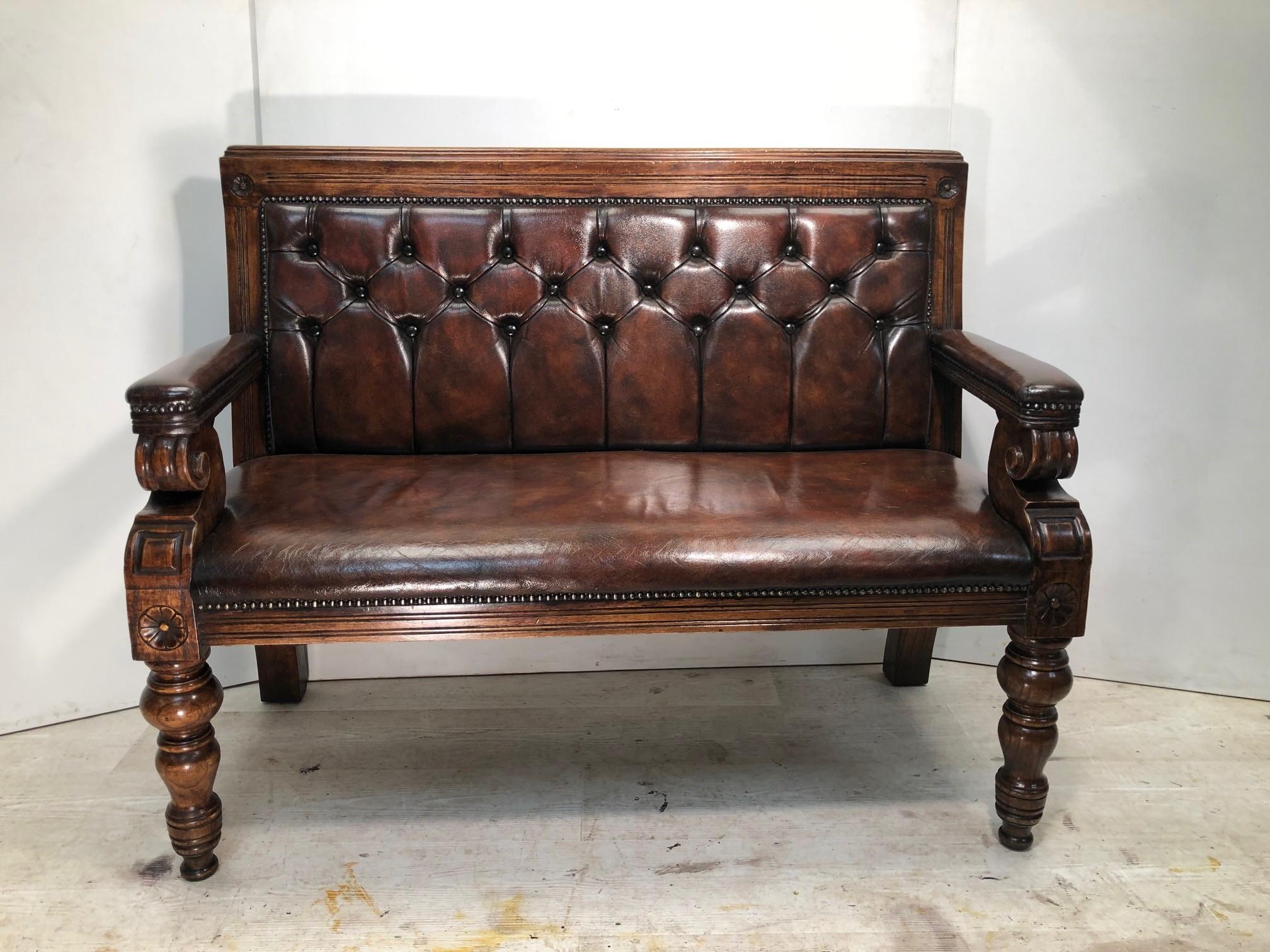 We are delighted to offer for sale this antique circa 1900, fully restored, hand dyed brown leather Chesterfield bench with oak frame

A very good looking well made and decorative bench, this is a quintessentially English, country house bench, it