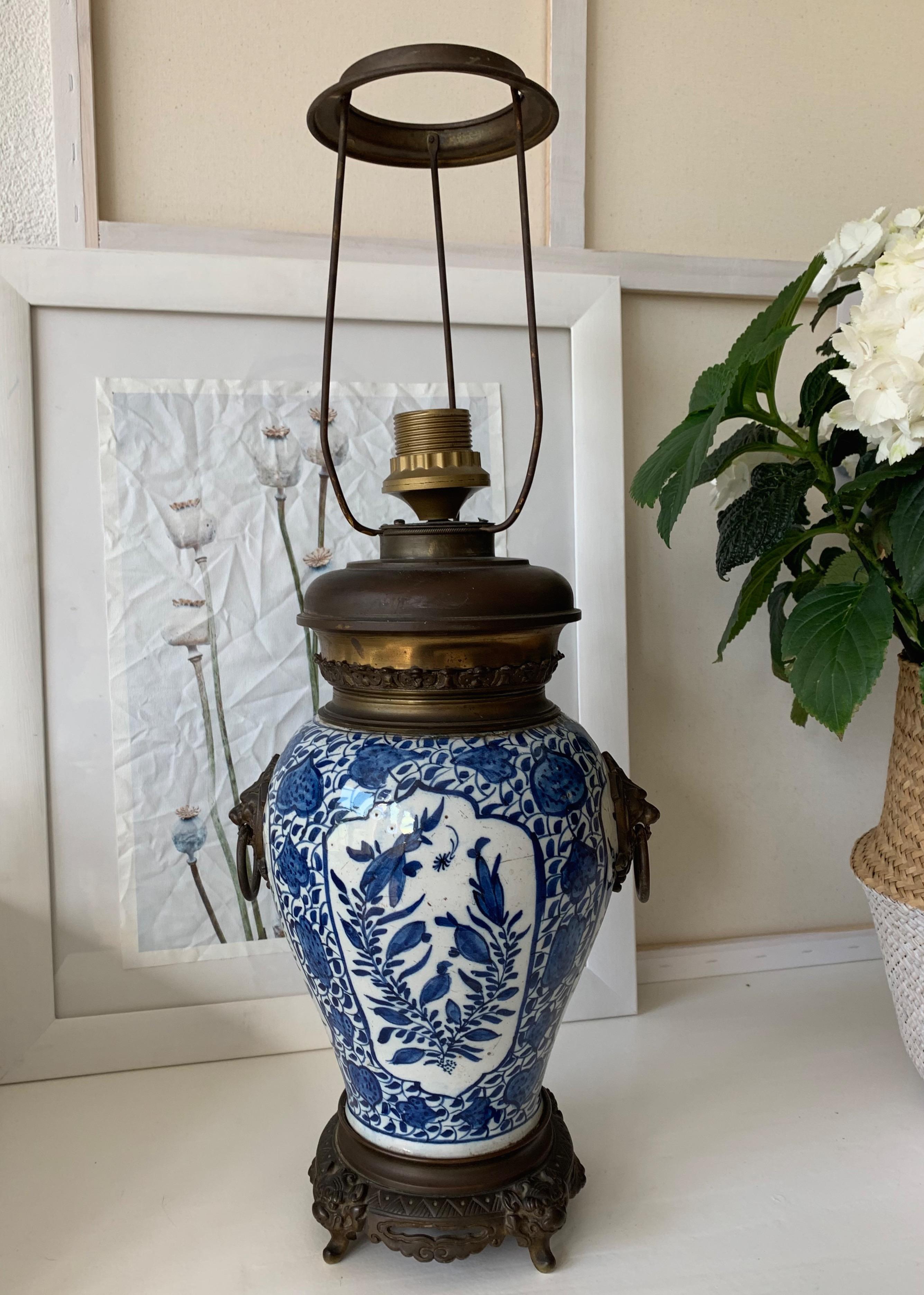 Decorative Dutch Delftware blue vase with floral decoration, made into a table lamp.

If you ask people around the world what Holland is best known for then in most cased our Delftware will be in the top five of the answers we get. This large, 18th