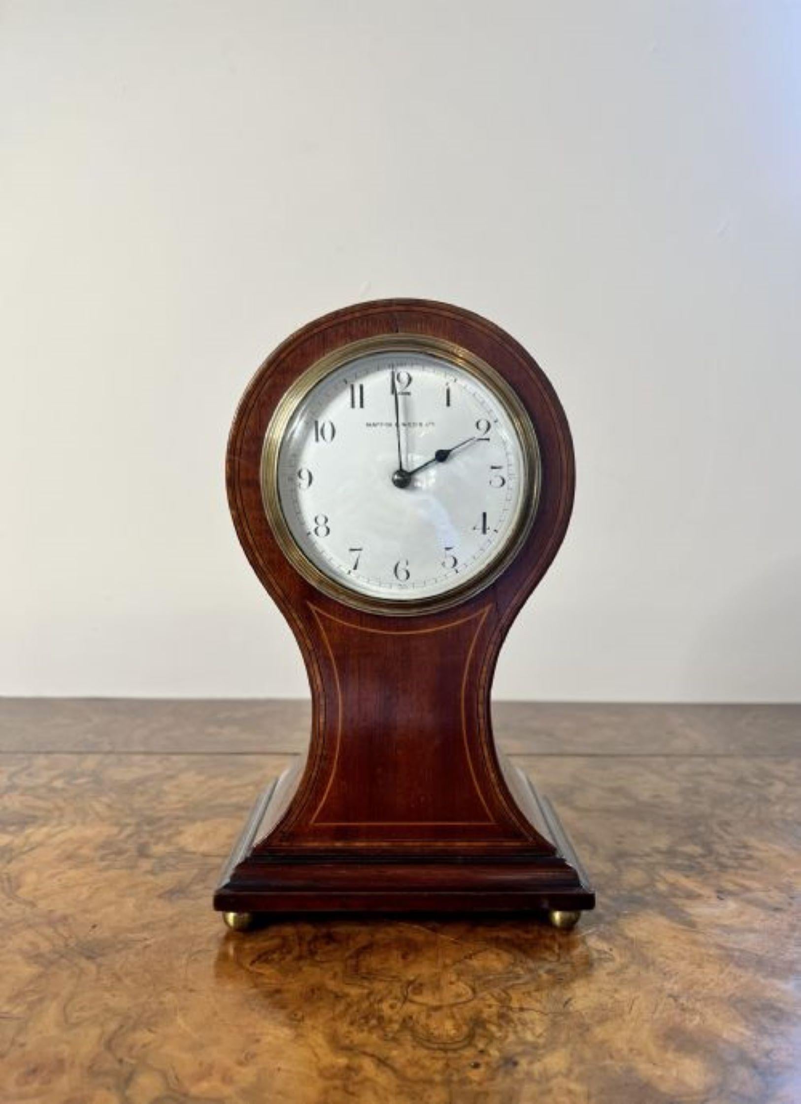 Stunning antique Edwardian inlaid mahogany balloon shaped mantle clock by Mappin & Webb, having a quality mahogany inlaid case, with a white enamel dial raised on four bun feet.
Please note all of our clocks are serviced prior to delivery we do