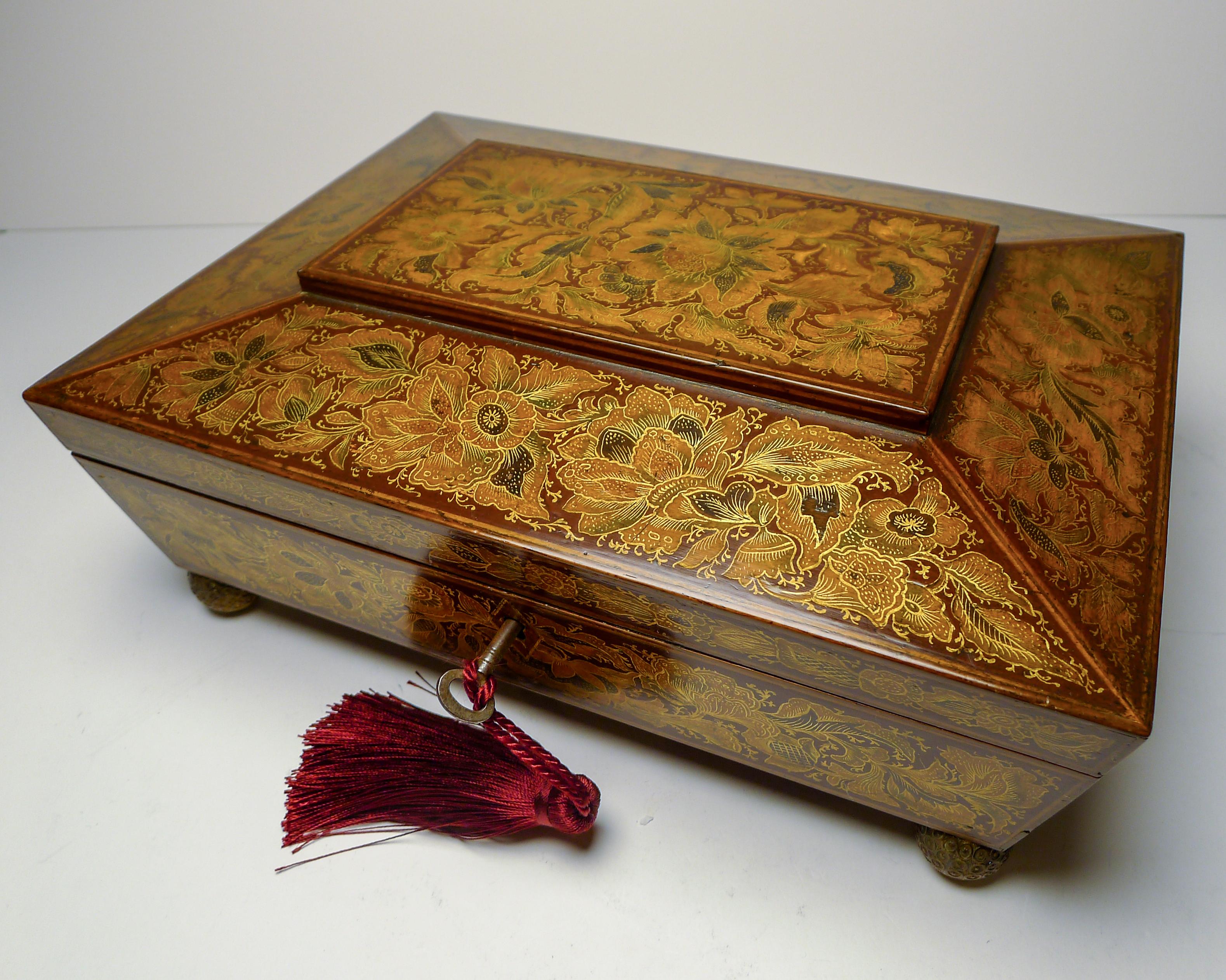 About as exotic and decorative as they get, this magnificent playing card / games box has a deep red / Burgundy background which is smothered in the most exquisite fine penwork with plenty of gold creating an outstanding look. The box has been