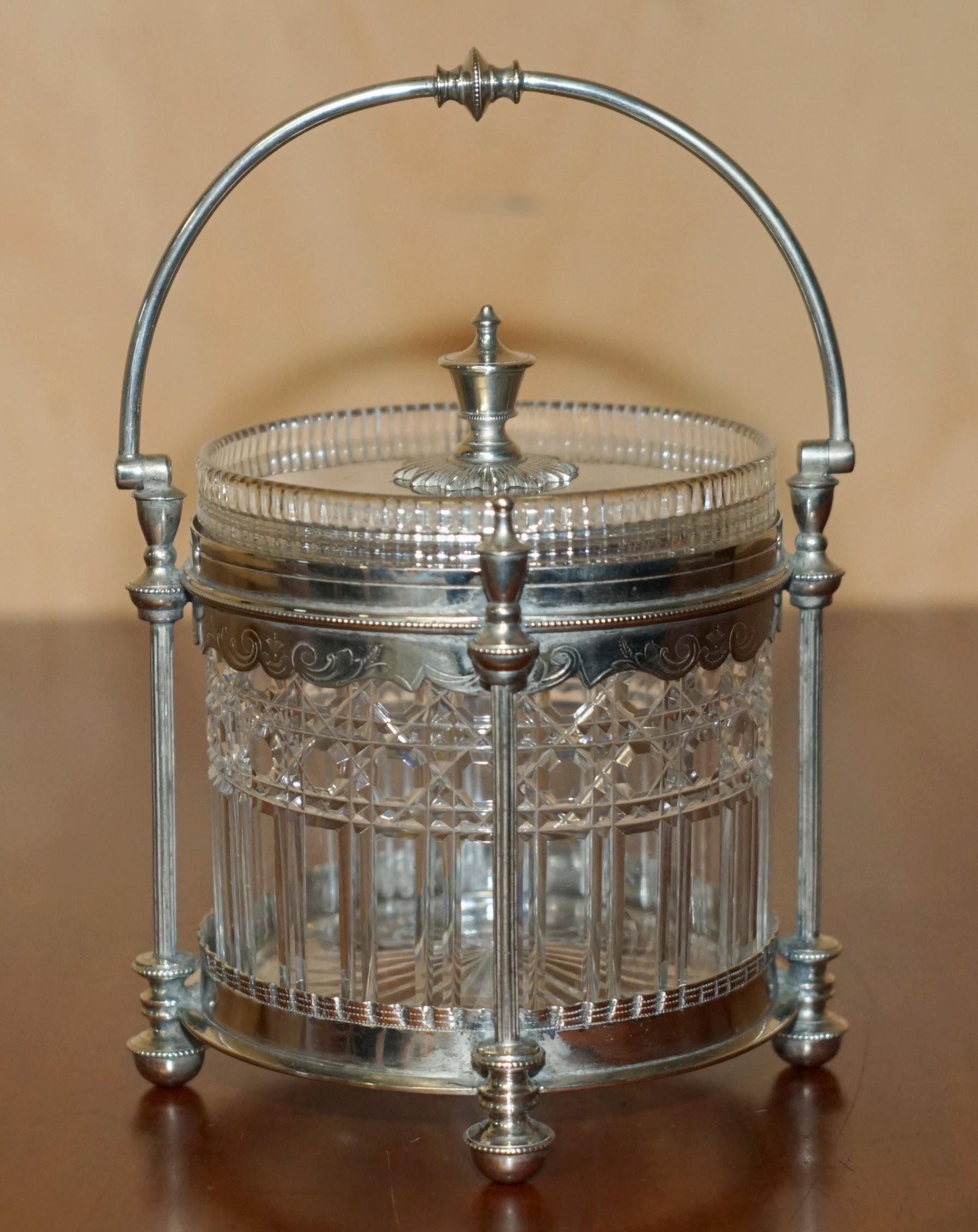 Royal House Antiques

Royal House Antiques is delighted to offer for sale this absolutely stunning original circa 1860-1870 Silver plated cut glass Crystal biscuit barrel jar

What a sublime find, it is truly stunning, I love this piece from every