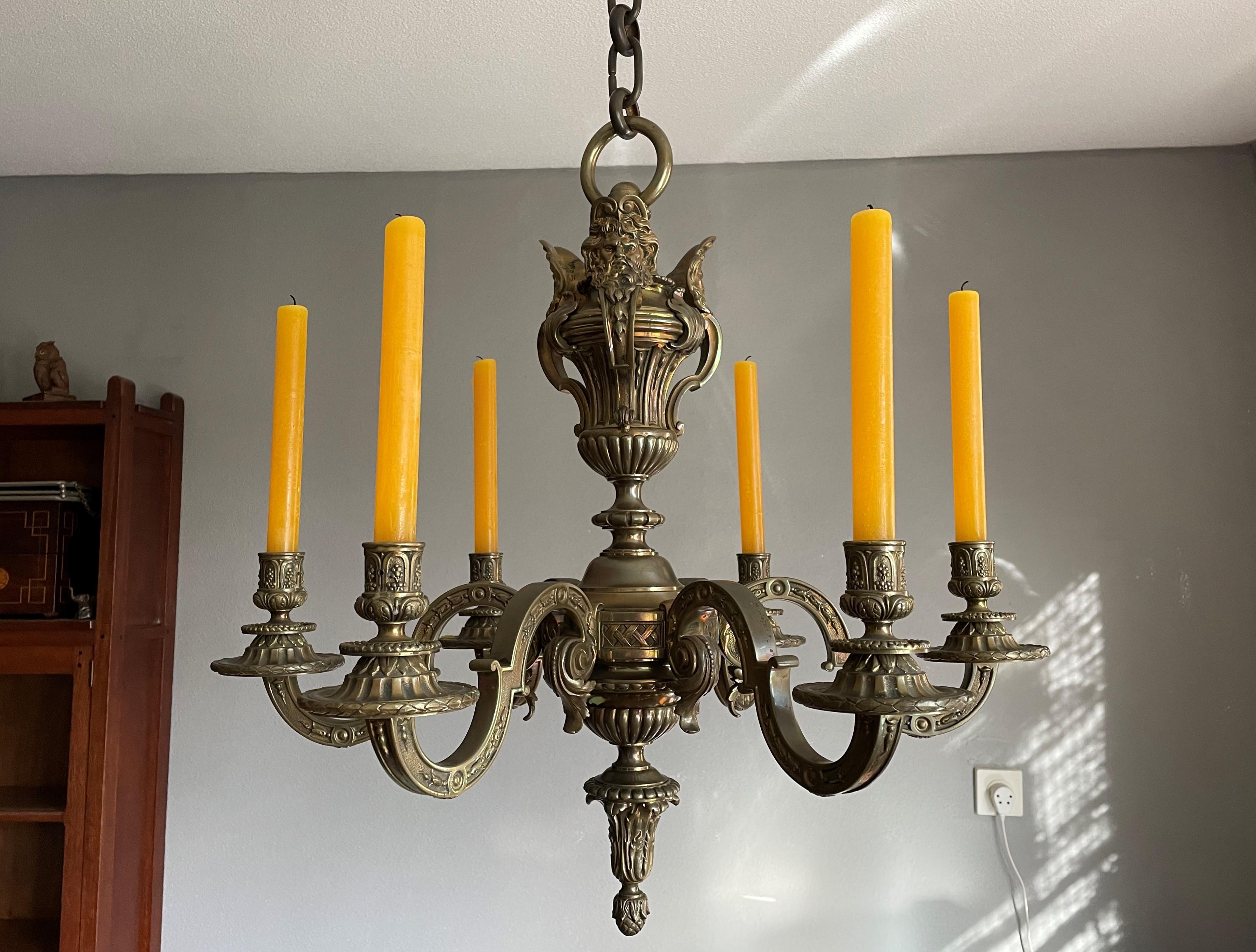 Remarkable bronze chandelier from 19th century France with striking masks of Zeus.

This top quality crafted, antique French chandelier is another great example showing that the French in those days were leading when it came to creating the best