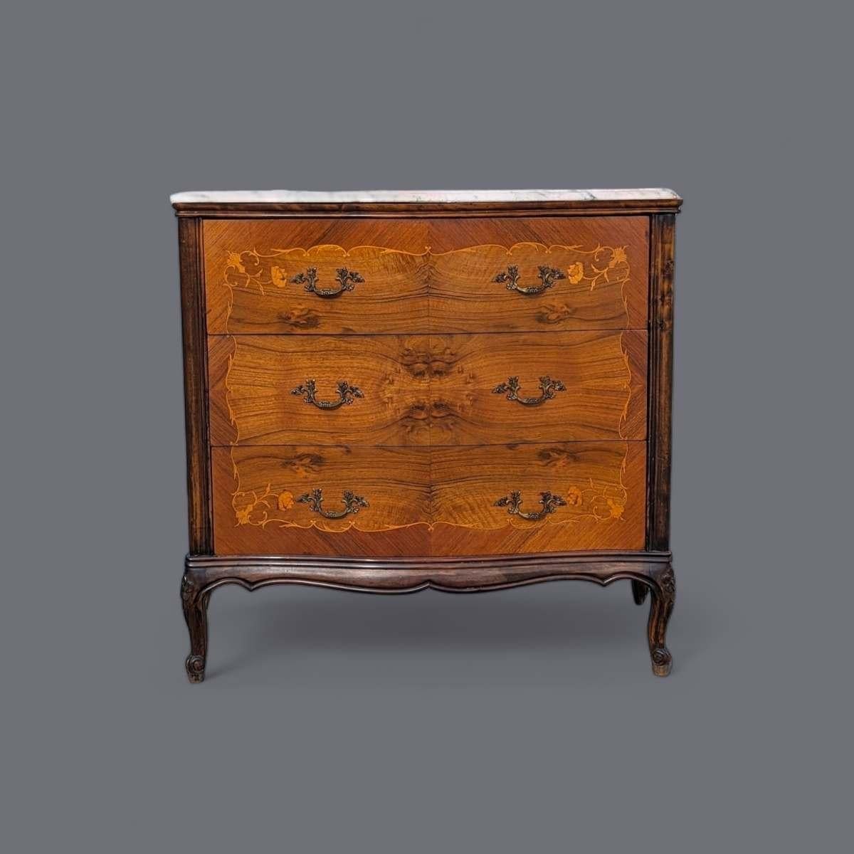 Presenting an exquisite antique French Louis XV style walnut buffet, crafted during the late 19th or early 20th century revival period. This stunning piece showcases the enduring elegance and opulence of the Rococo style, with its graceful curves,