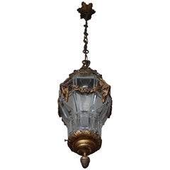 Stunning Used Hallway or Stairwell Pendant w. Four Bronze Ram Head Sculptures