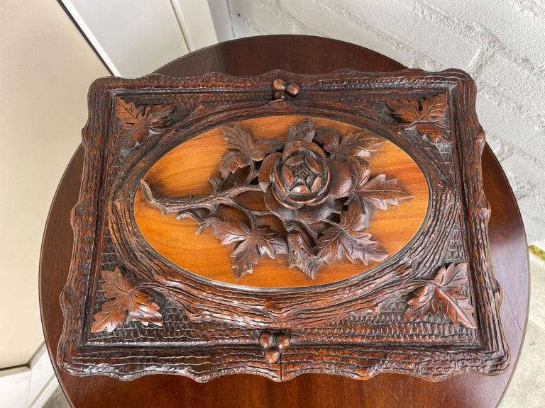 Masterly carved and good size, two tone Black Forest jewelry box from circa 1880.

If you are a collector of truly beautiful Black Forest artwork then you will love this 19th century, multi-purpose box. The first thing that draws your attention is