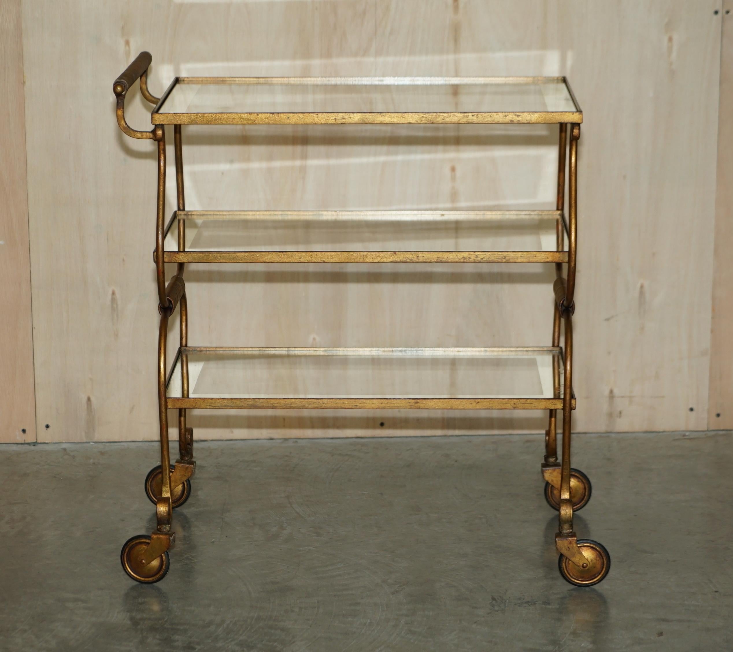 We are delighted to offer for sale this very fine, circa 1950’s Mid-Century Modern brass and glass Italian drinks trolley

A good looking well made and decorative piece, the beauty of this piece is in the subtle detailing, it has a wonderfully