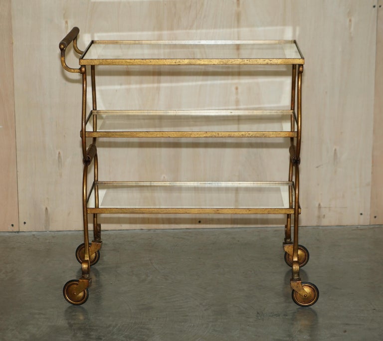 We are delighted to offer for sale this very fine, circa 1950’s Mid-Century Modern brass and glass Italian drinks trolley

A good looking well made and decorative piece, the beauty of this piece is in the subtle detailing, it has a wonderfully
