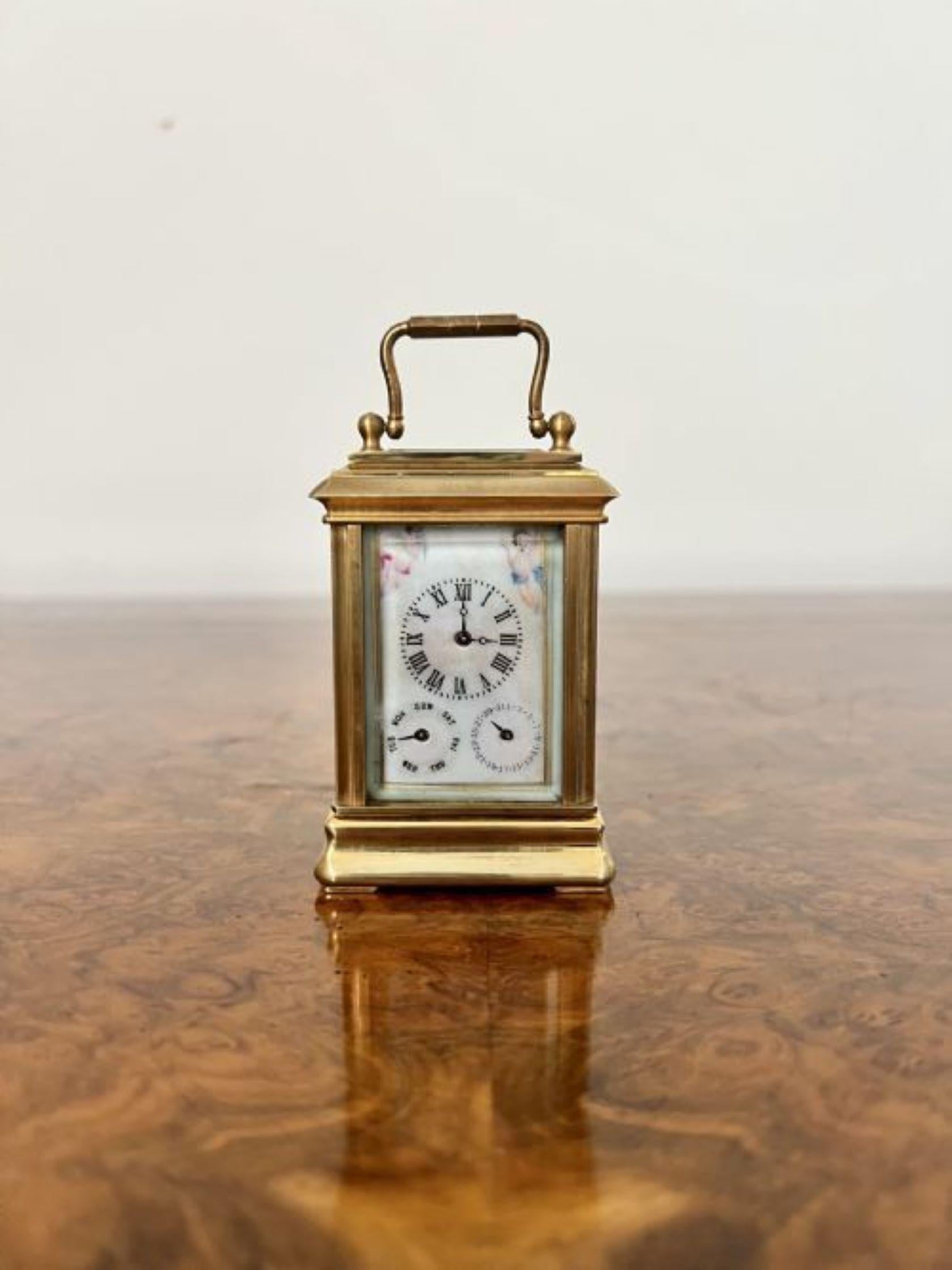 Stunning antique miniature quality brass carriage clock with hand painted porcelain panels having a day and date dial, wonderful hand painted porcelain panels decorated with cherubs in fantastic green, blue, red and white colours with gold gilded