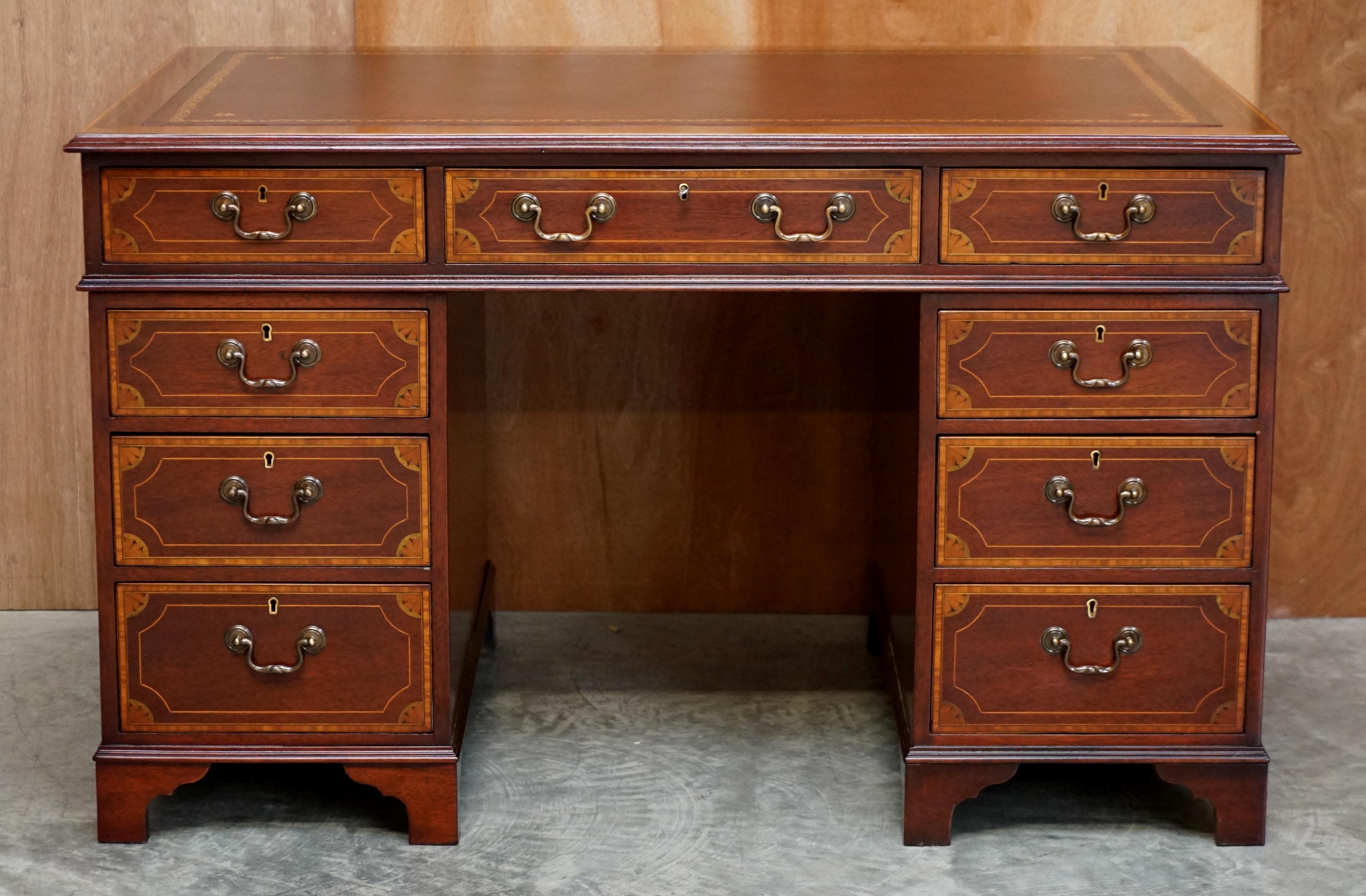 We are delighted to offer for sale this absolutely exquisite fully restored Victorian Sheraton Revival partner desk with oxblood leather writing surface

This is pretty much the finest desk I have ever seen, the quality of the inlaid is sublime,