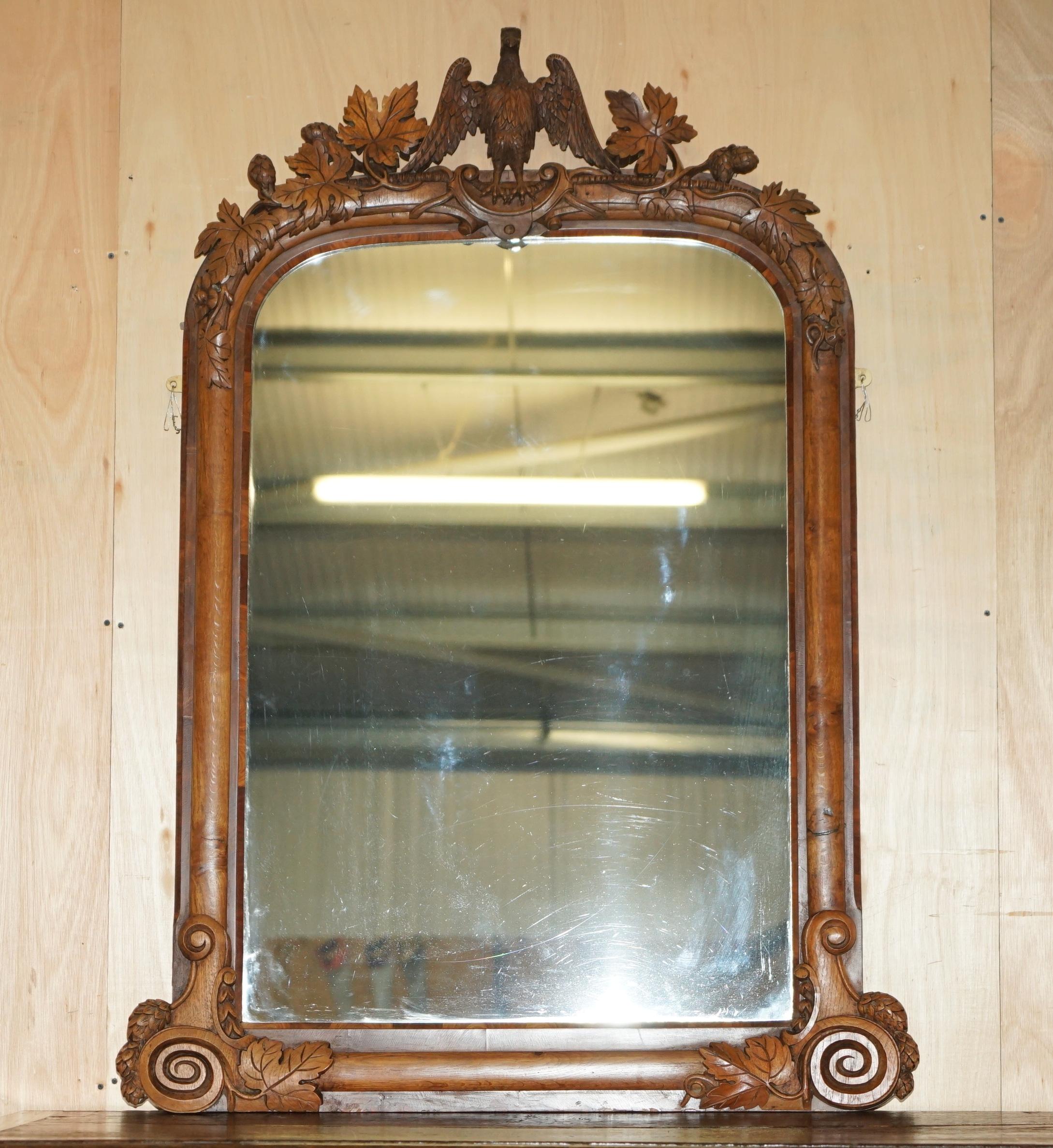 Royal House Antiques

Royal House Antiques is delighted to offer for sale this stunning circa 1860-1880 hand carved Walnut framed overmantel mirror with large American Eagle to the top

Please note the delivery fee listed is just a guide, it covers