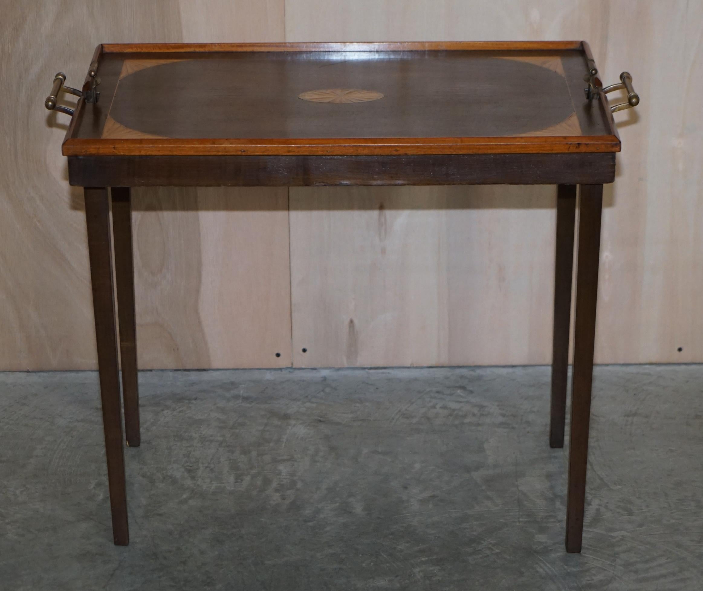We are delighted to offer for sale this extremely well made, antique Victorian, Sheraton Revival folding butlers tray table

A very good looking well made and decorative piece, it’s the perfect side for home and picnic use, its wonderfully over