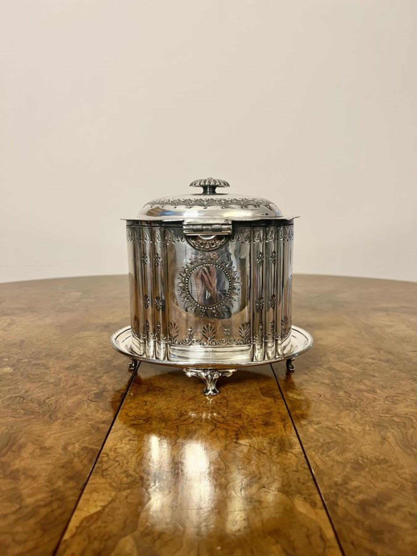 Stunning antique Victorian silver plated biscuit barrel having a quality antique Victorian silver plated biscuit barrel with fantastic quality ornate detail with a lift up lid opening to reveal a storage compartment with a circular base raised on
