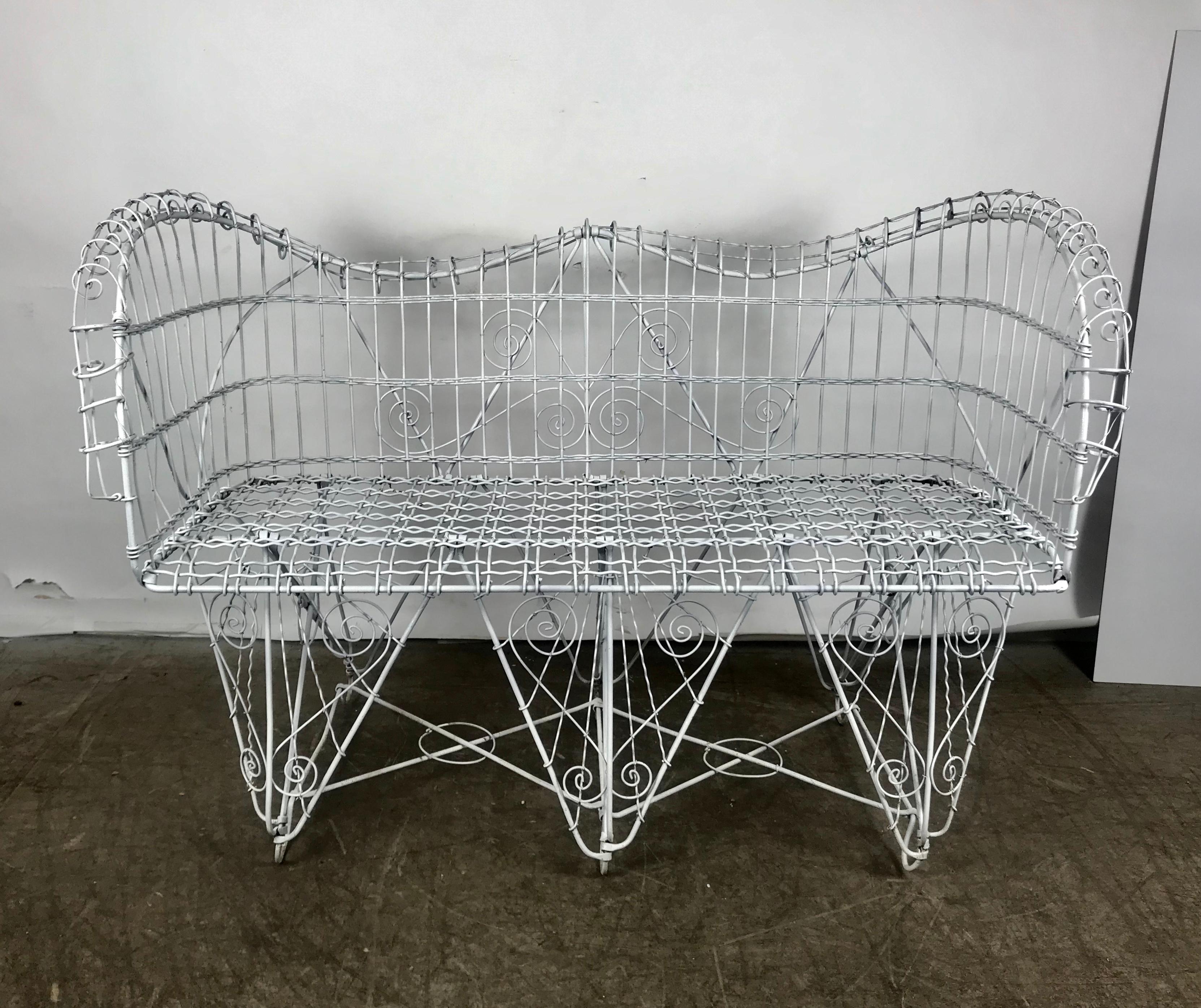 Stunning antique wire iron garden bench manner of Salterini, excellent condition, perfect addition to your outdoor living environment.